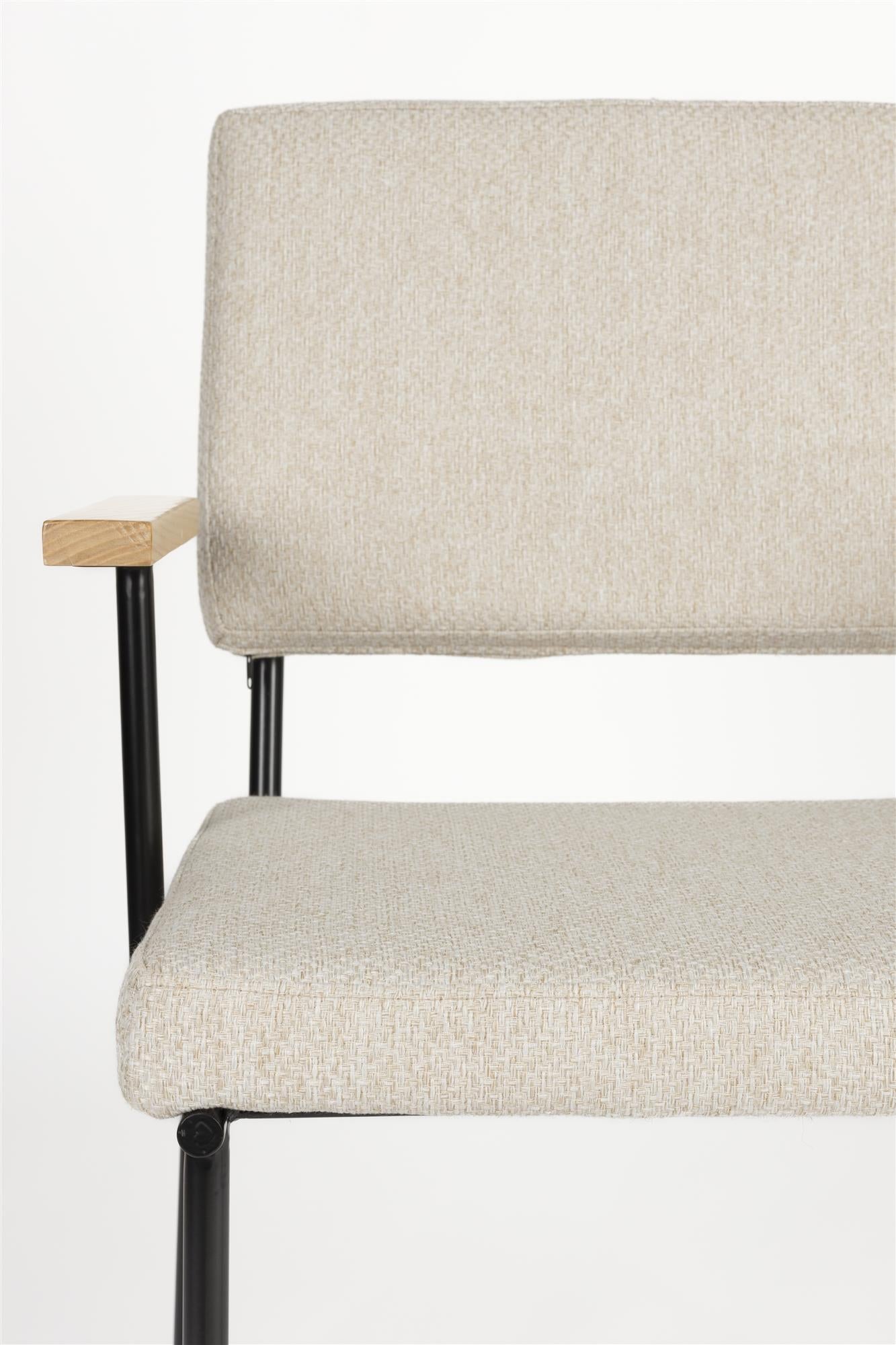 Chair with fellow beige armrests with a black base