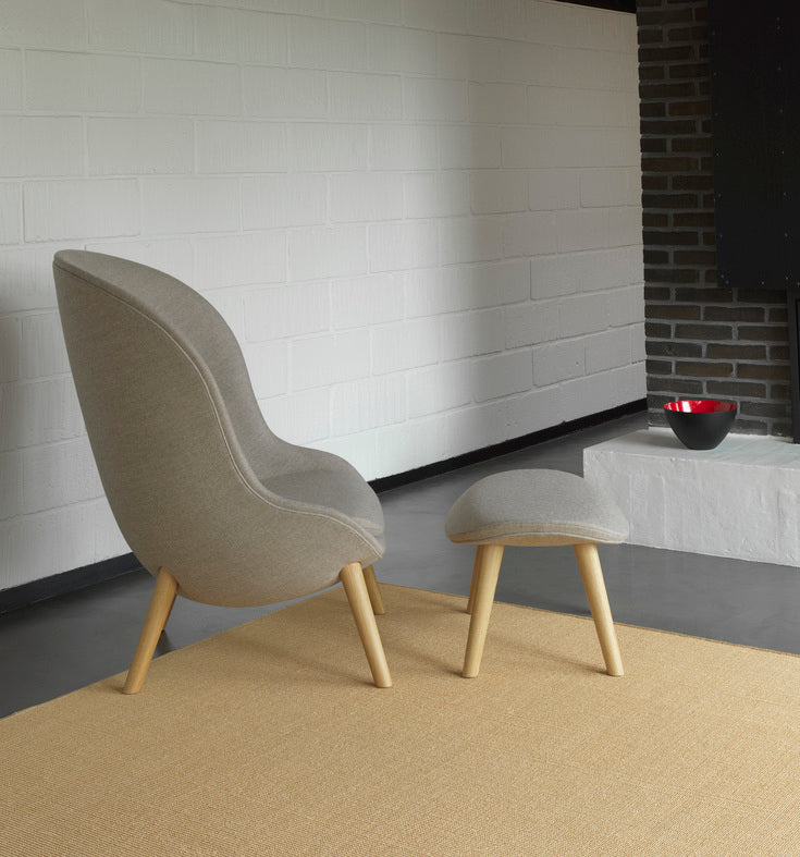HYG HIGH armchair with a black oak base