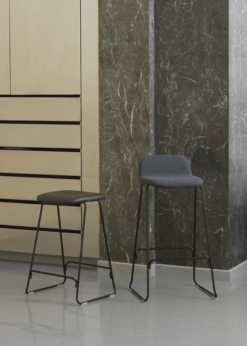 Bar chair upholstered just with a black base