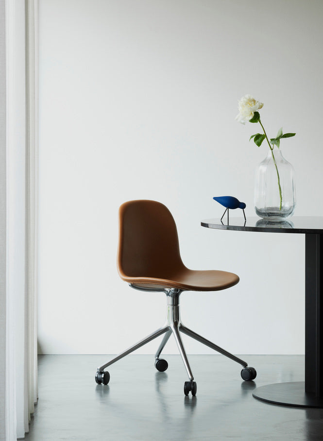 4W white office chair with an aluminum base on wheels