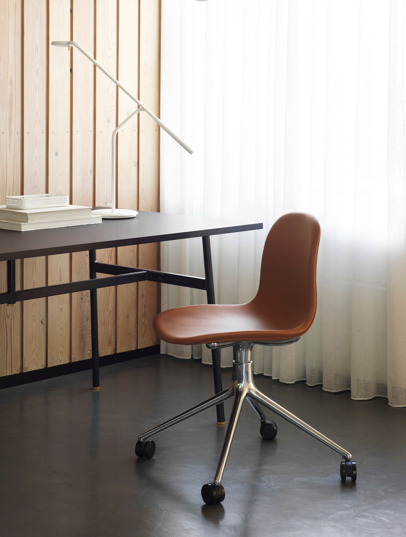 4W light gray office chair with a black base on wheels