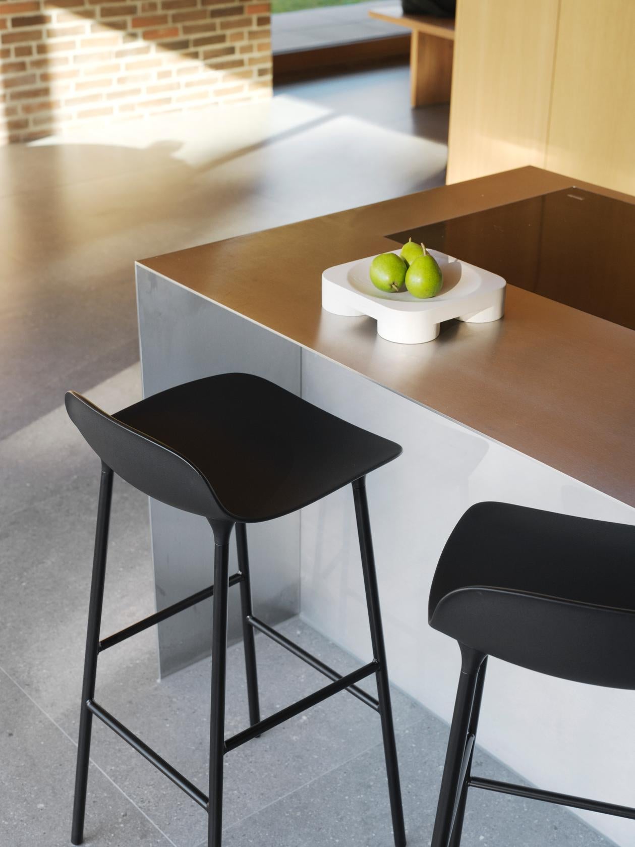 Hocker forms warm gray with a chrome base