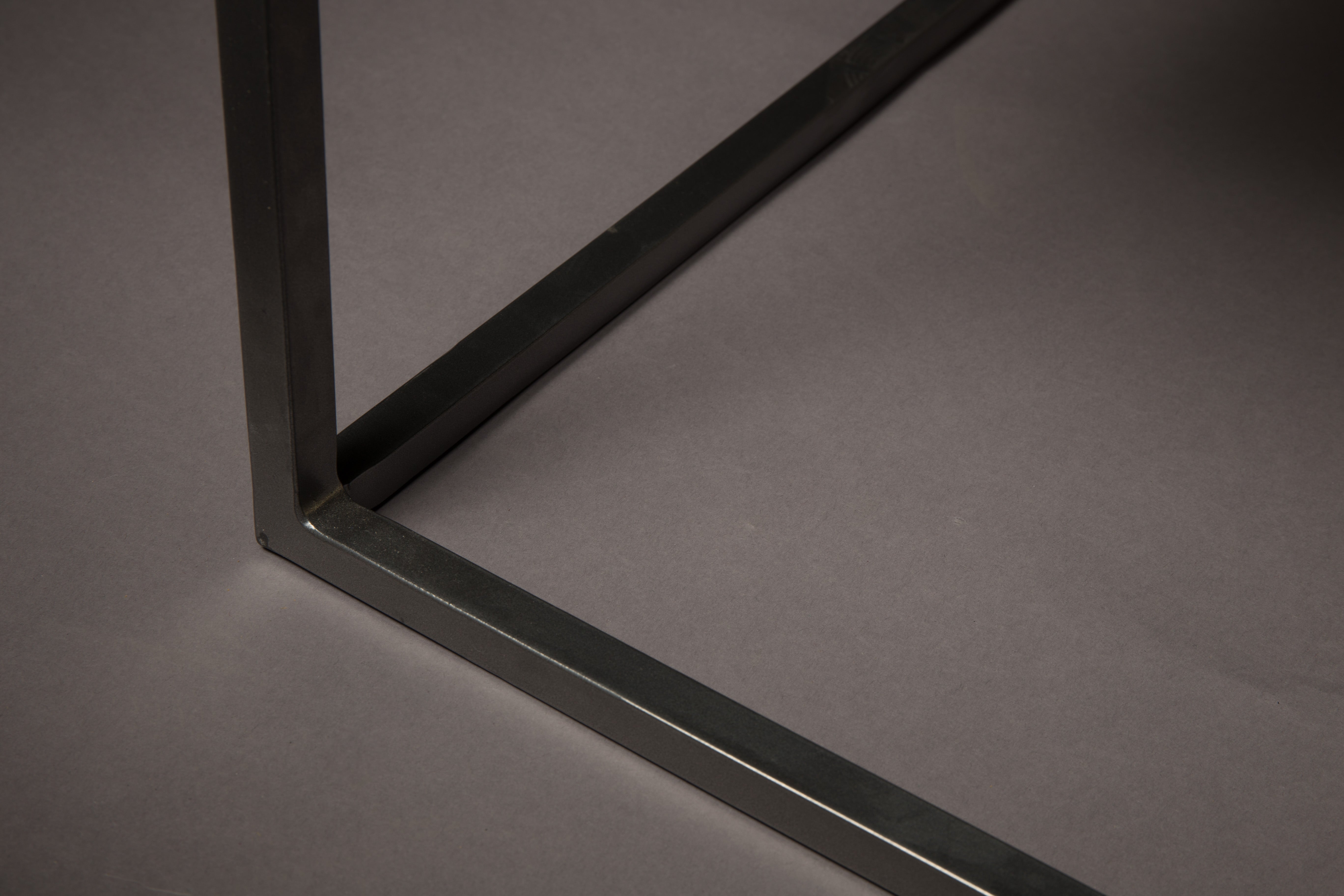 LEE dark brown coffee table with a black base