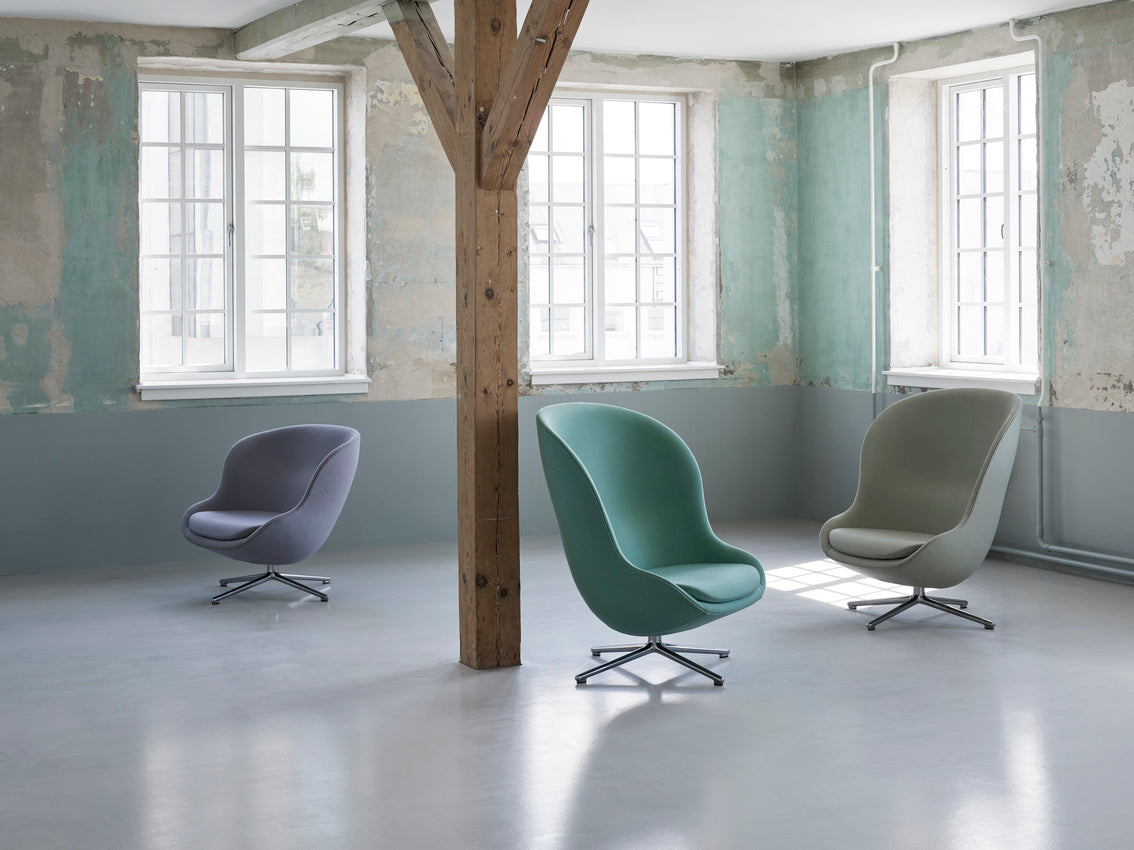 HYG HIGH armchair with an aluminum adjustable base