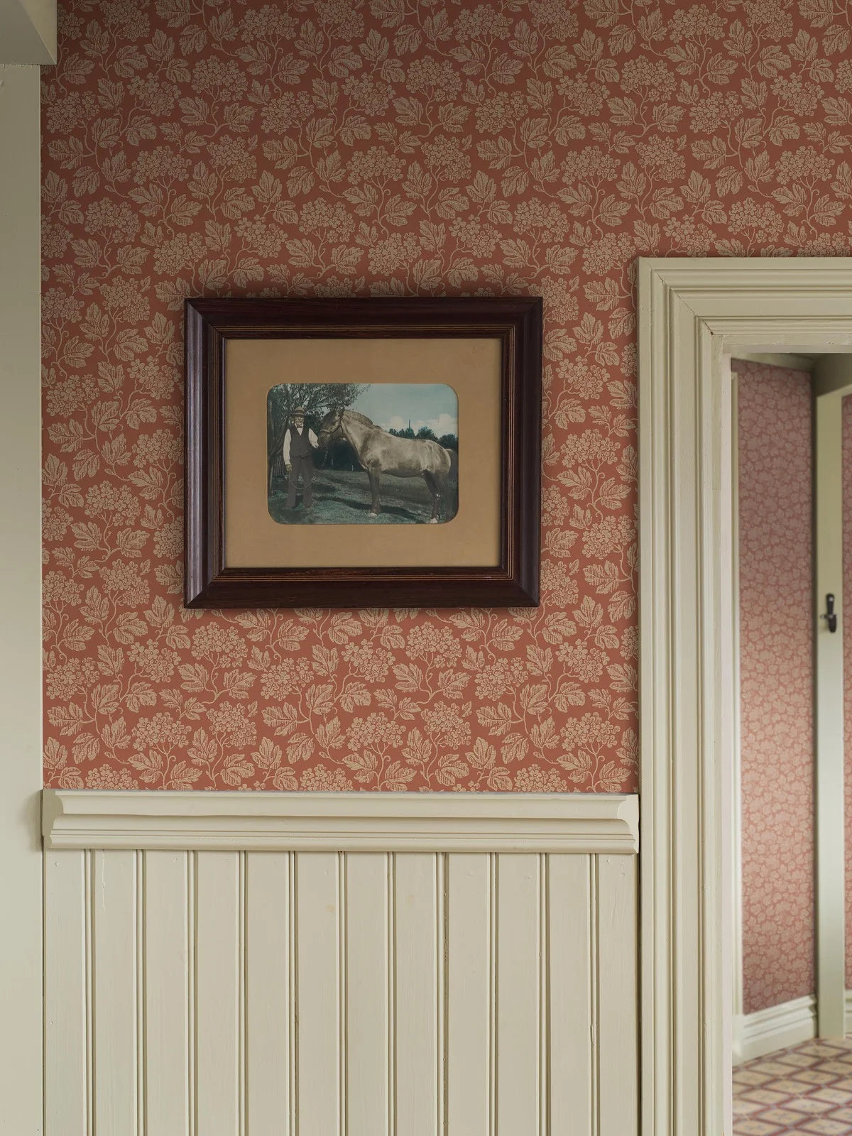 Non-woven paper wallpaper with a botanical pattern HAGTORN terracotta