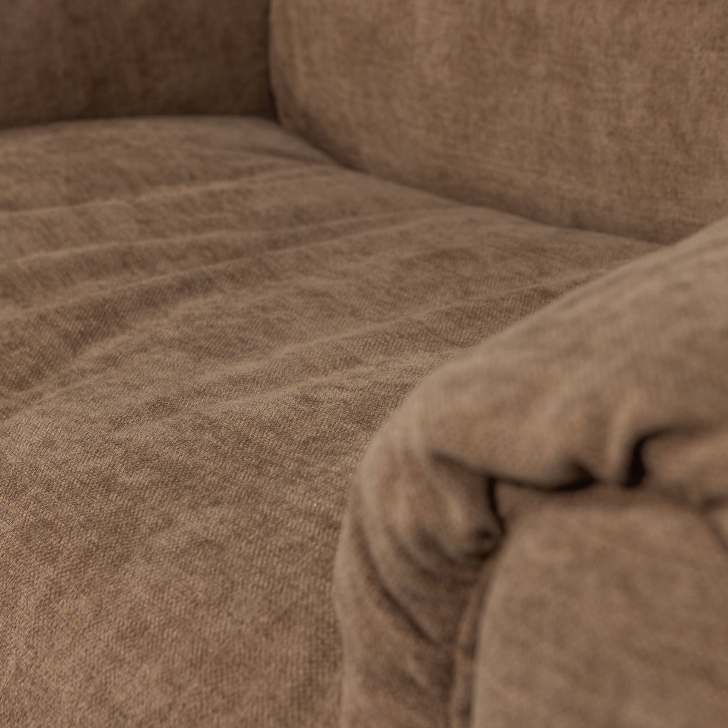 BAGGY brown armchair