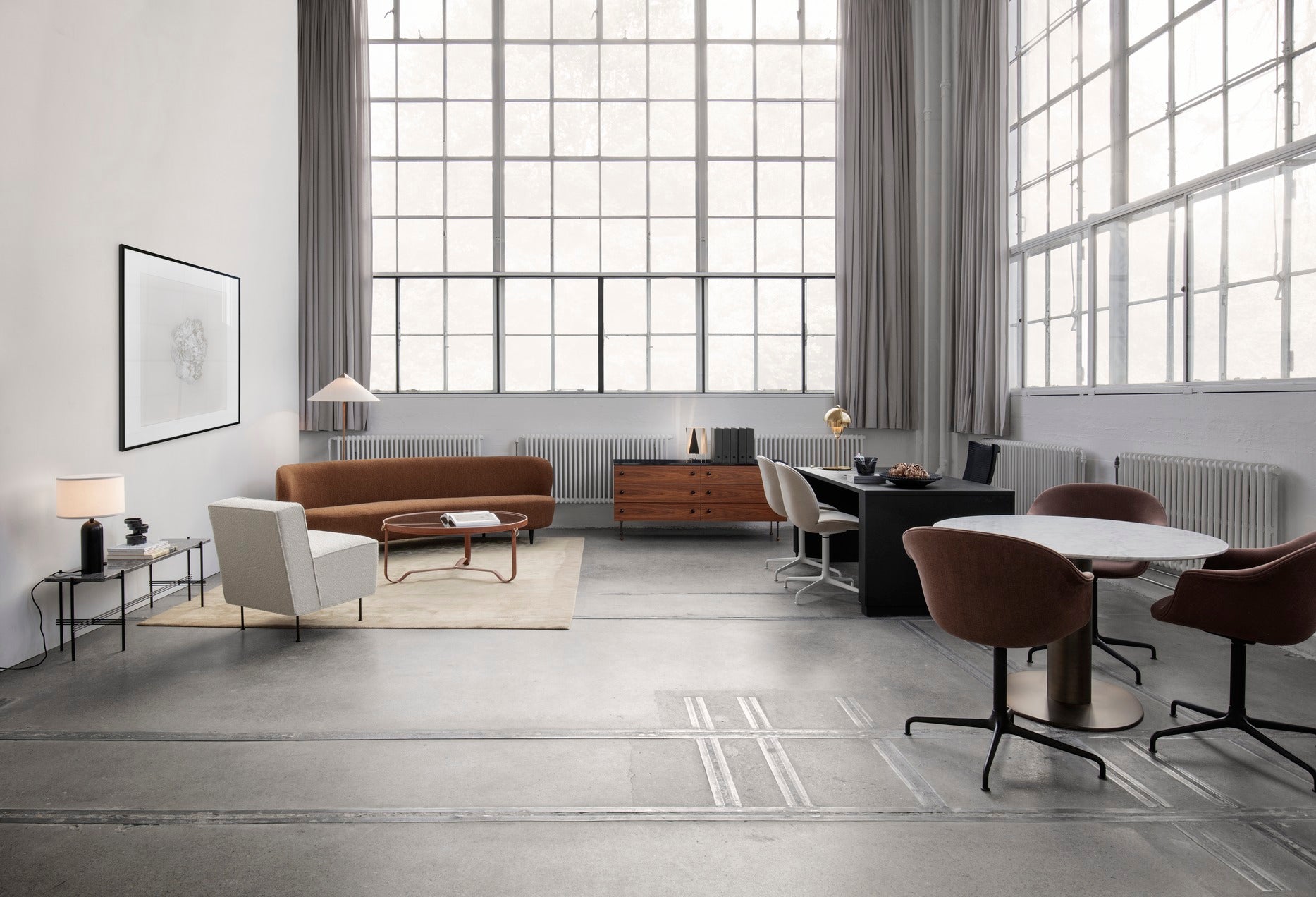 MODERN LINE upholstered armchair with a black base