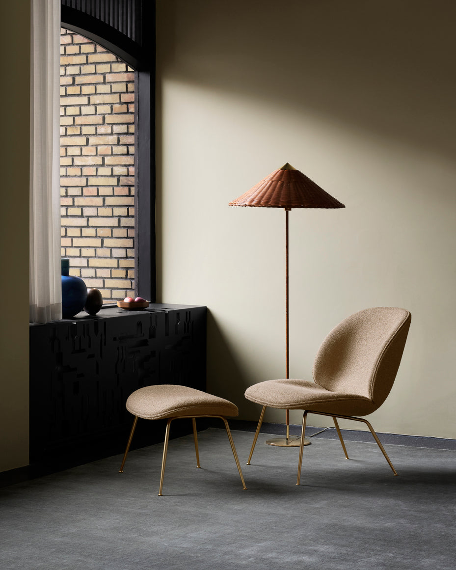 BEETLE pouf upholstered with a gold base