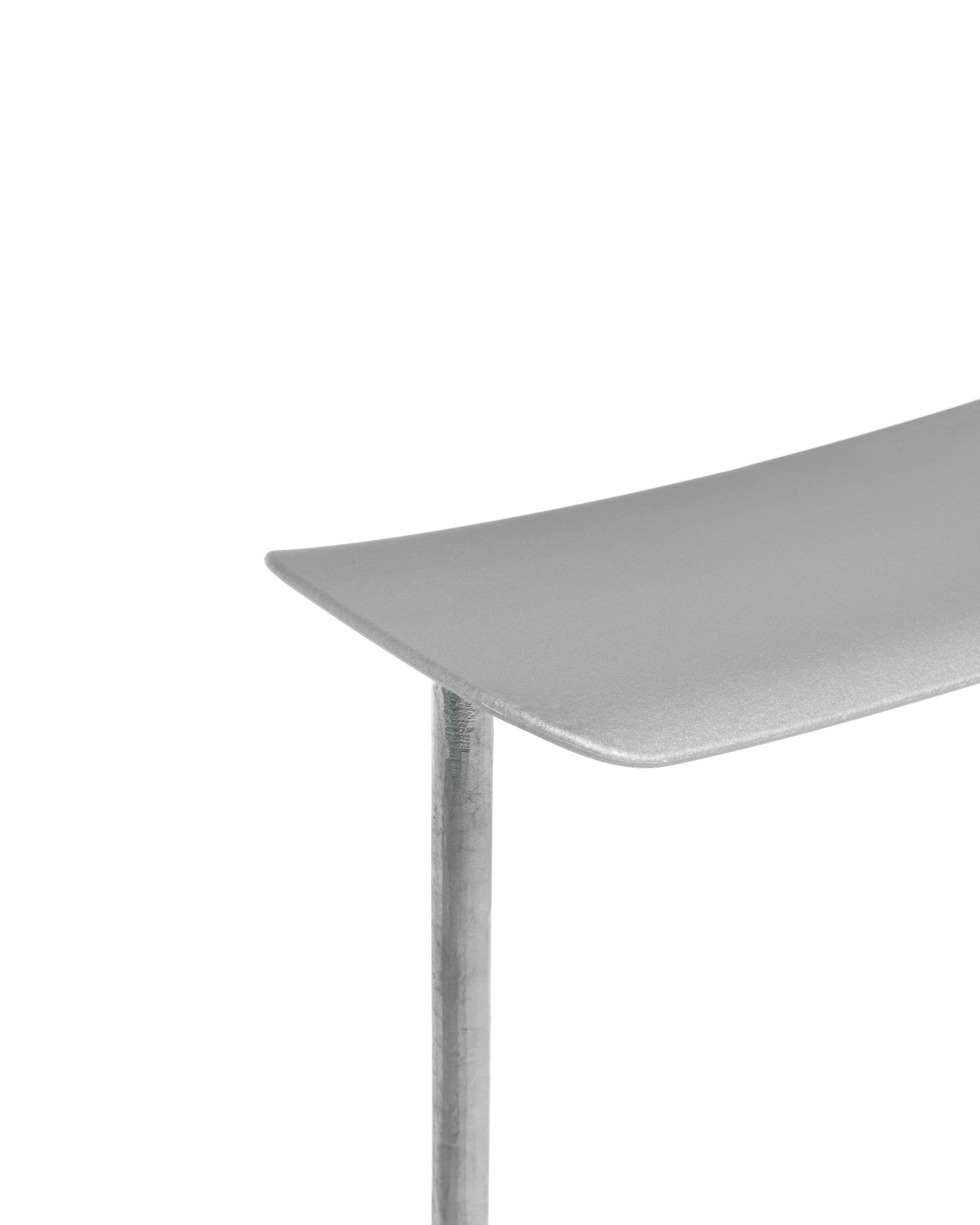 OFFICINA bar stool with a metal base and metallic seat