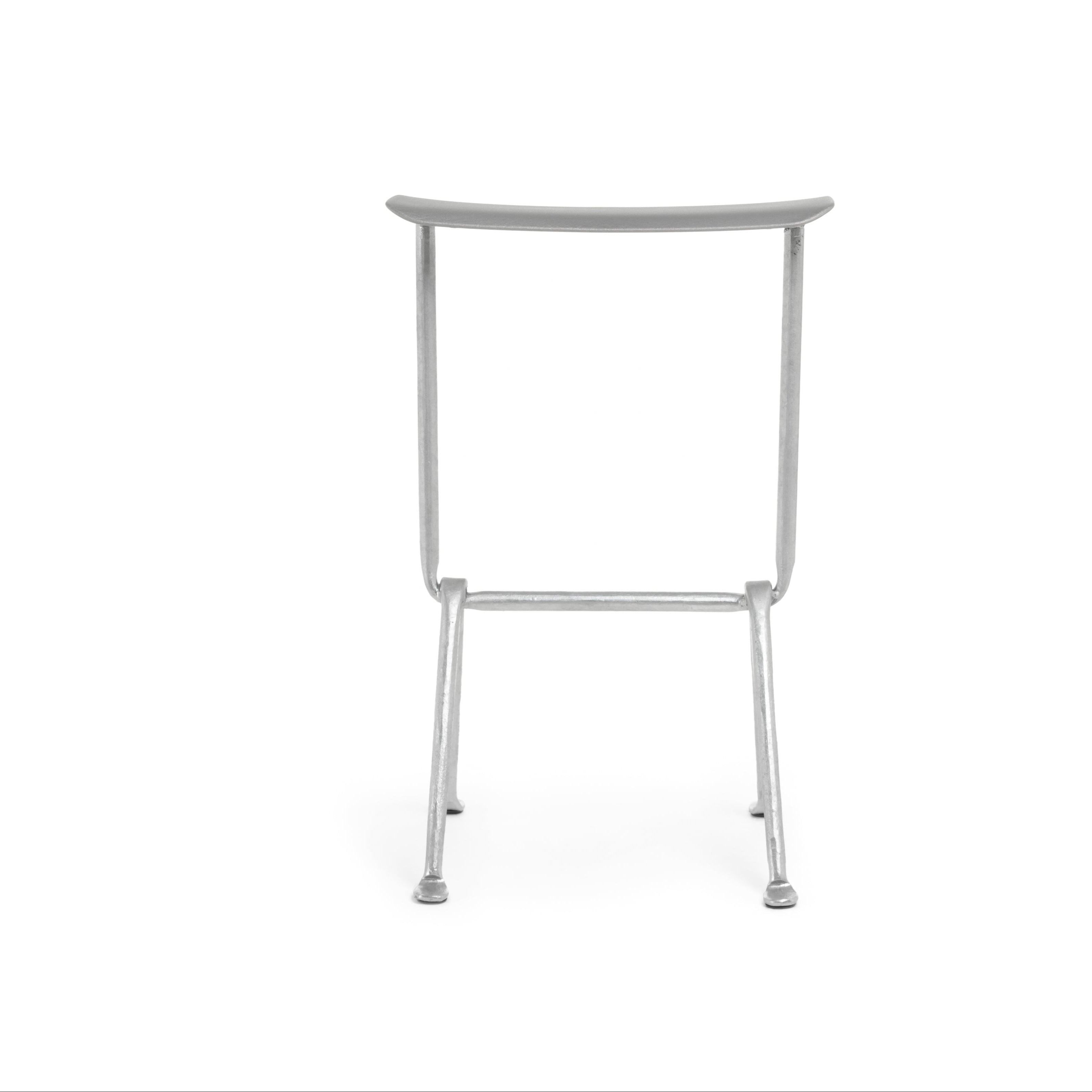 OFFICINA bar stool with a metal base and metallic seat