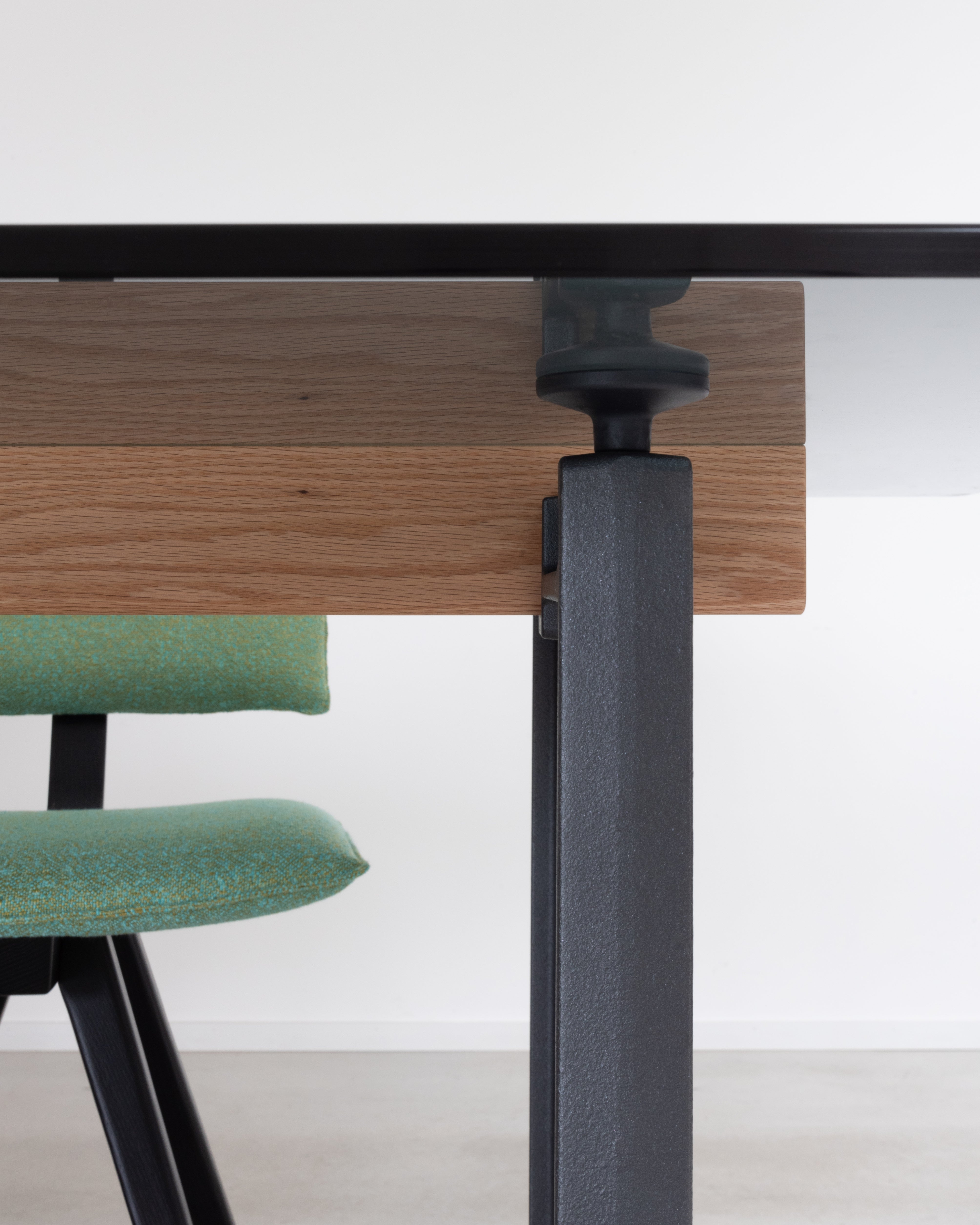 TRAVE upholstered chair with a black ash base