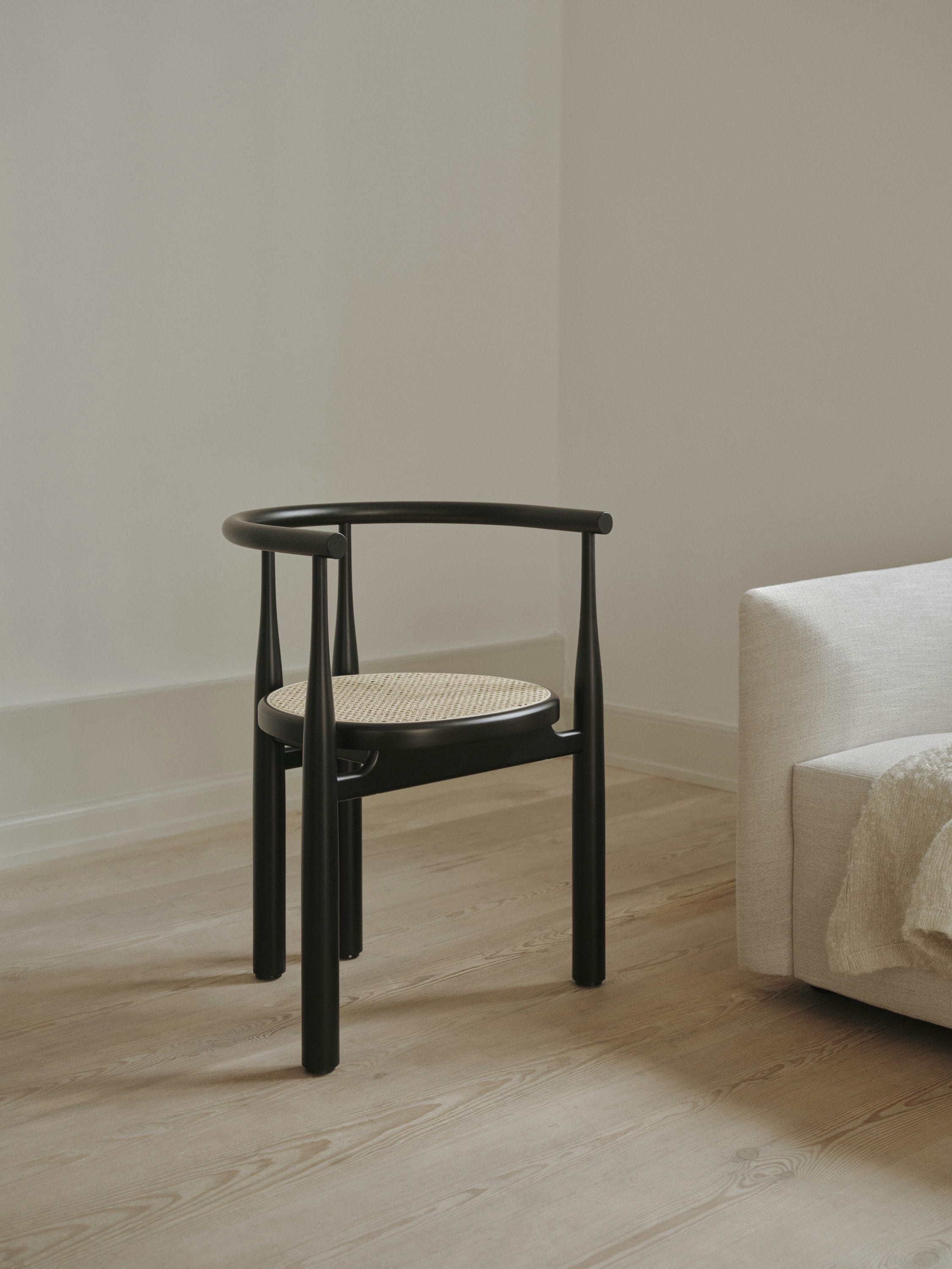 Bukowski chair braided seat with a black beech base