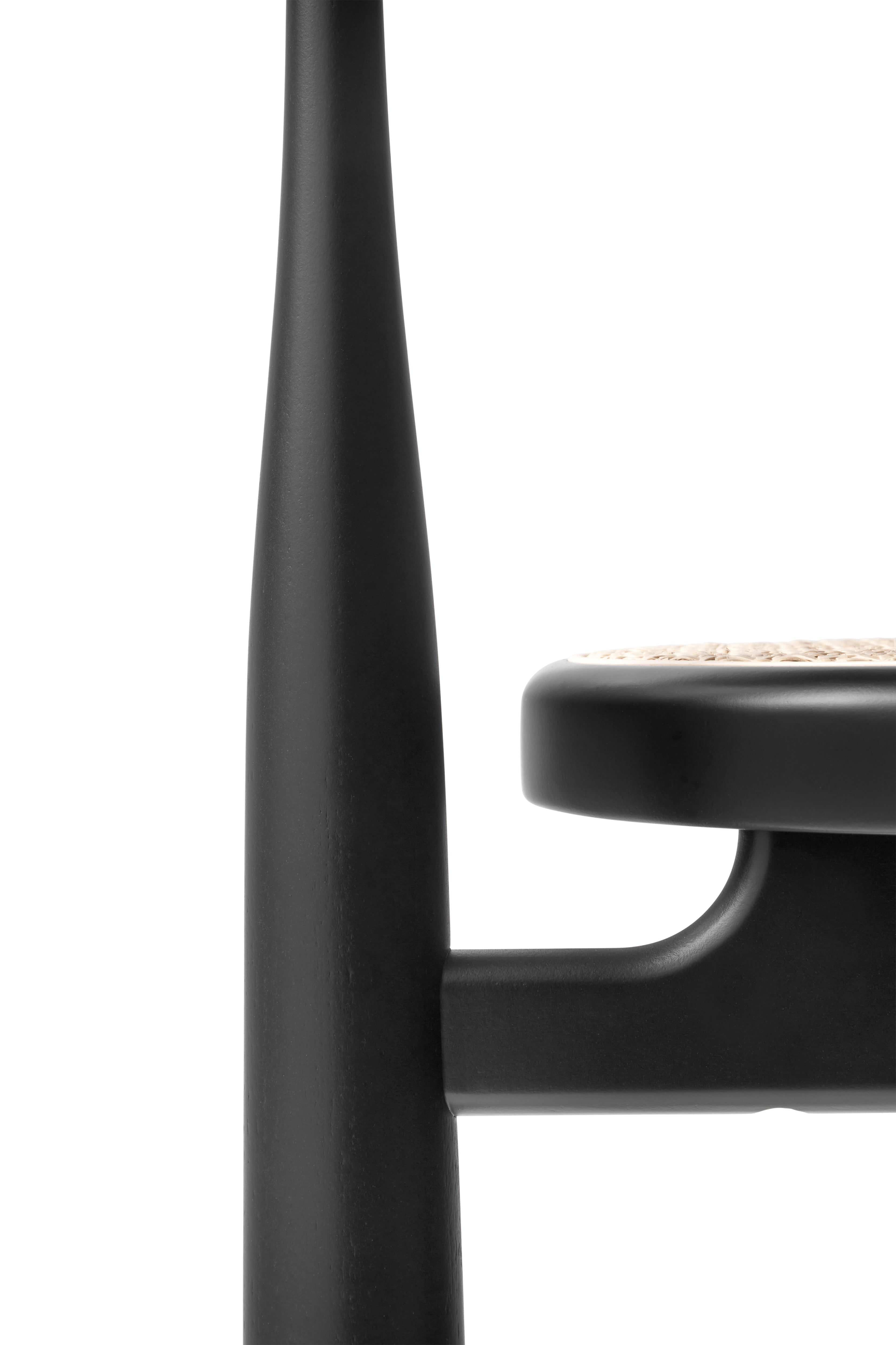 Bukowski chair braided seat with a black beech base