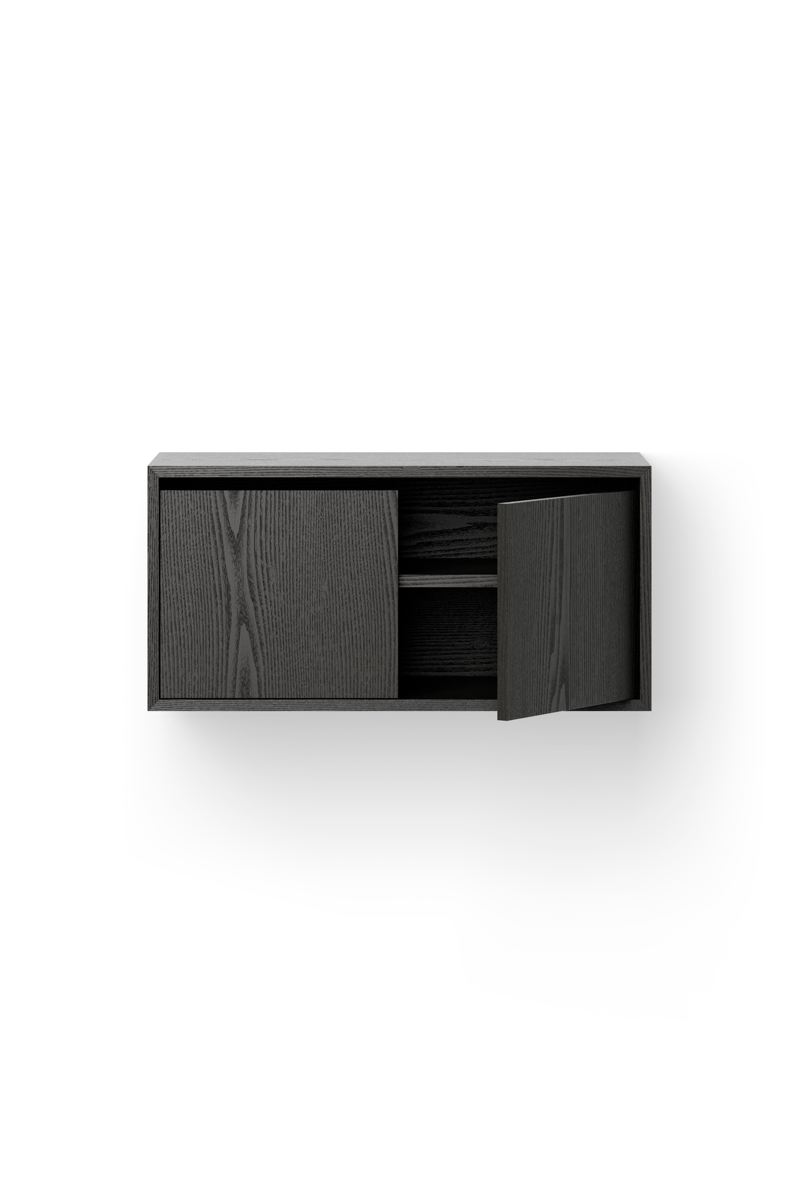 Hanging cabinet with new works door black ash veneer