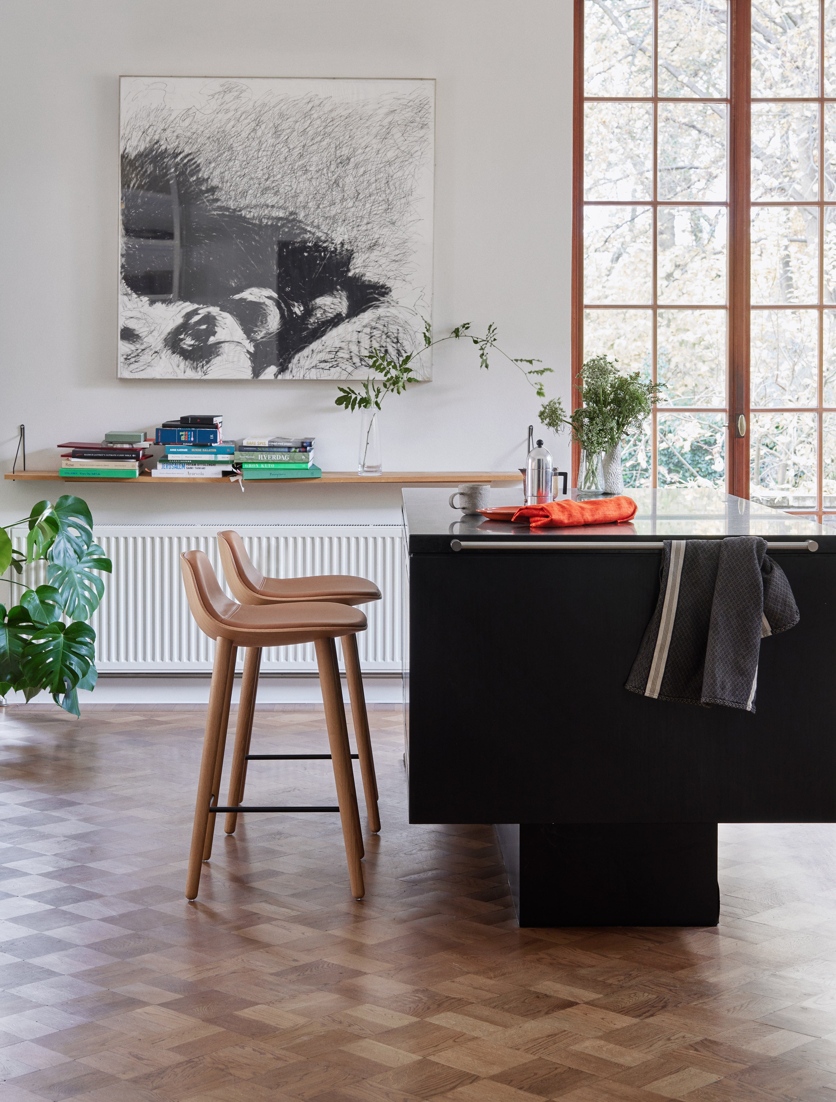 YUUGA stool in brown with a wooden base