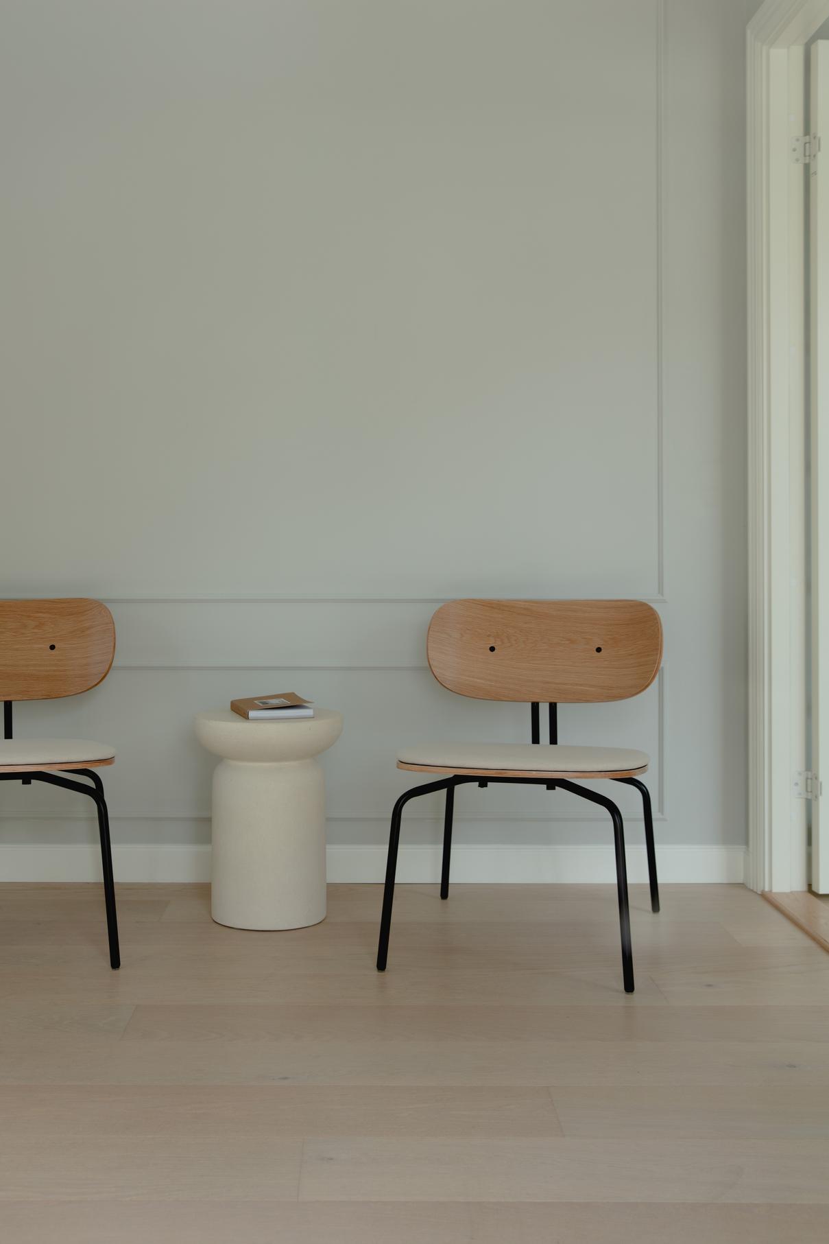 Curious armchair brown plush with a black base
