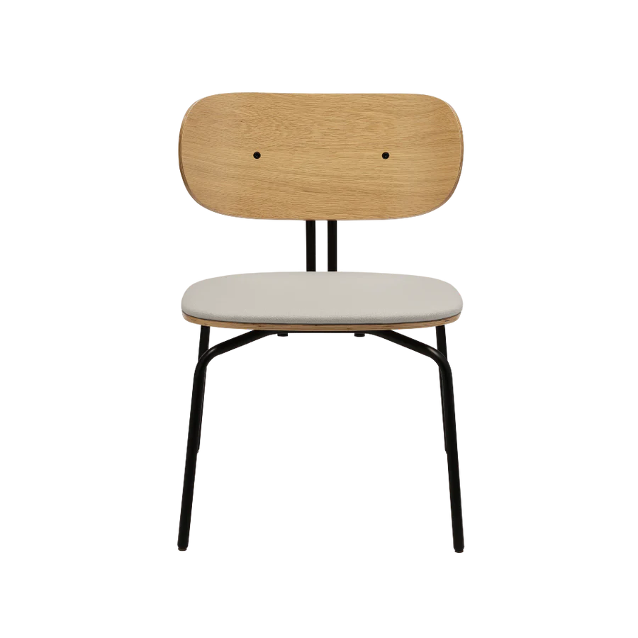 Schwarzer beige neugieriger Sessel mit einer schwarzen Basis