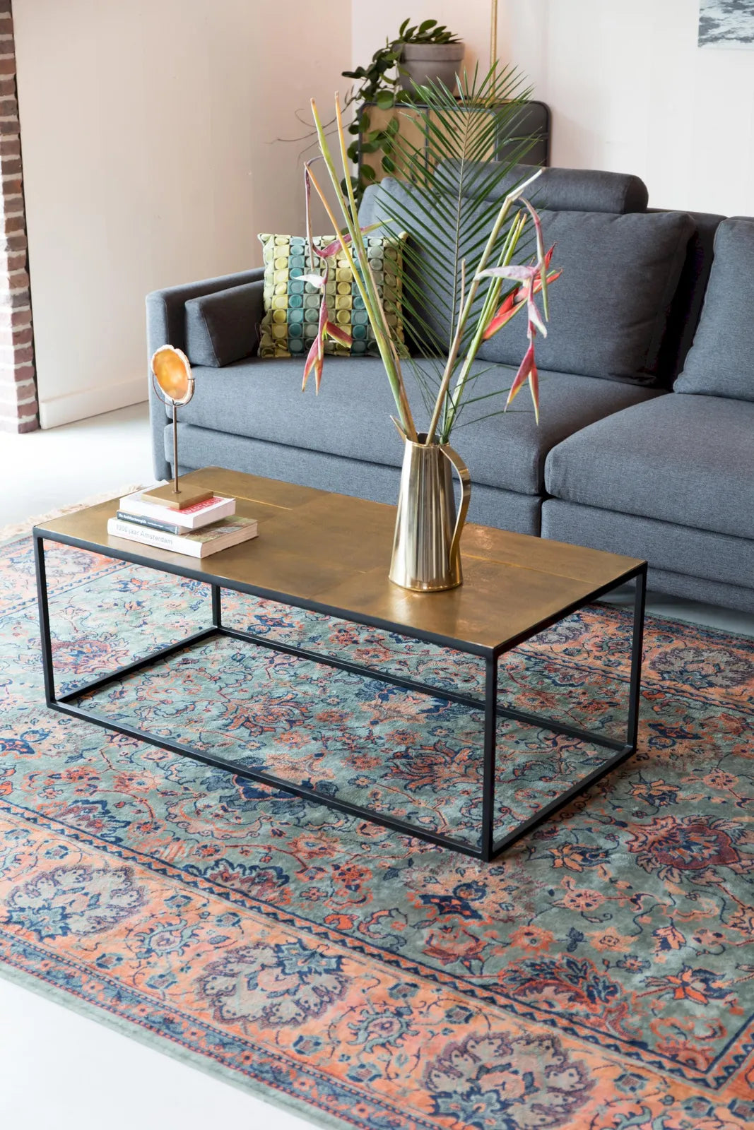 LEE dark brown coffee table with a black base