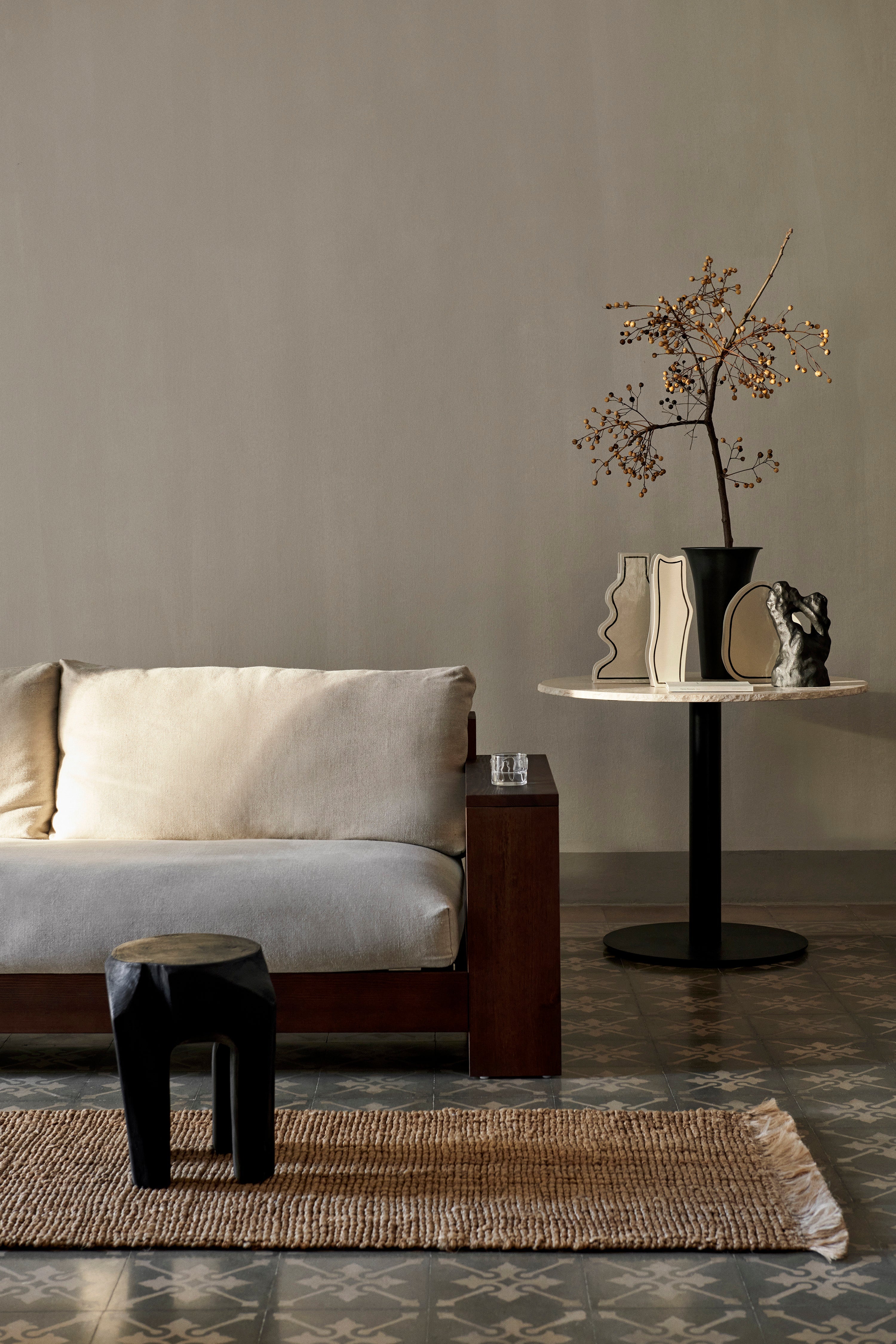 Edre beige sofa with a dark brown wooden base