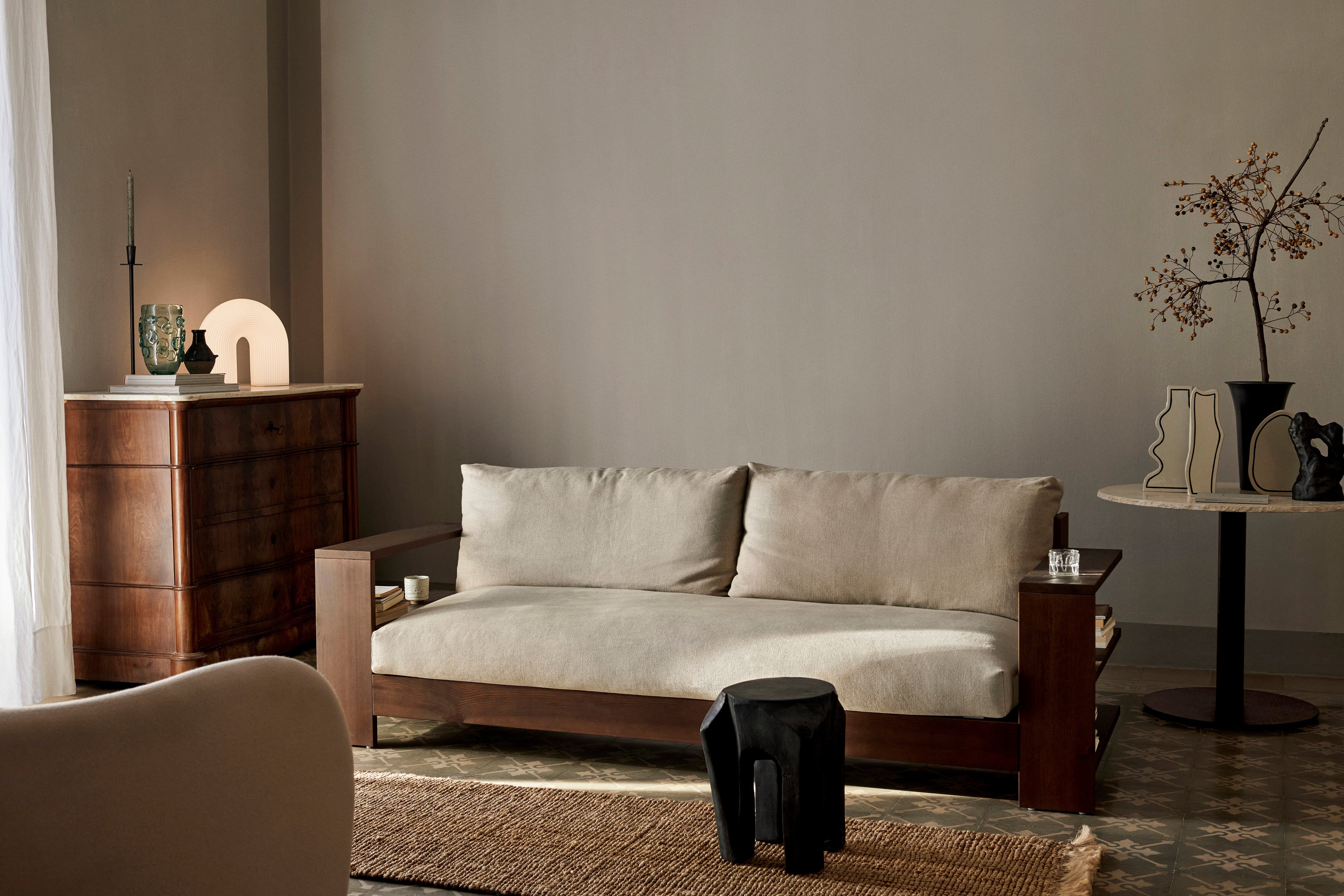 Edre beige sofa with a dark brown wooden base