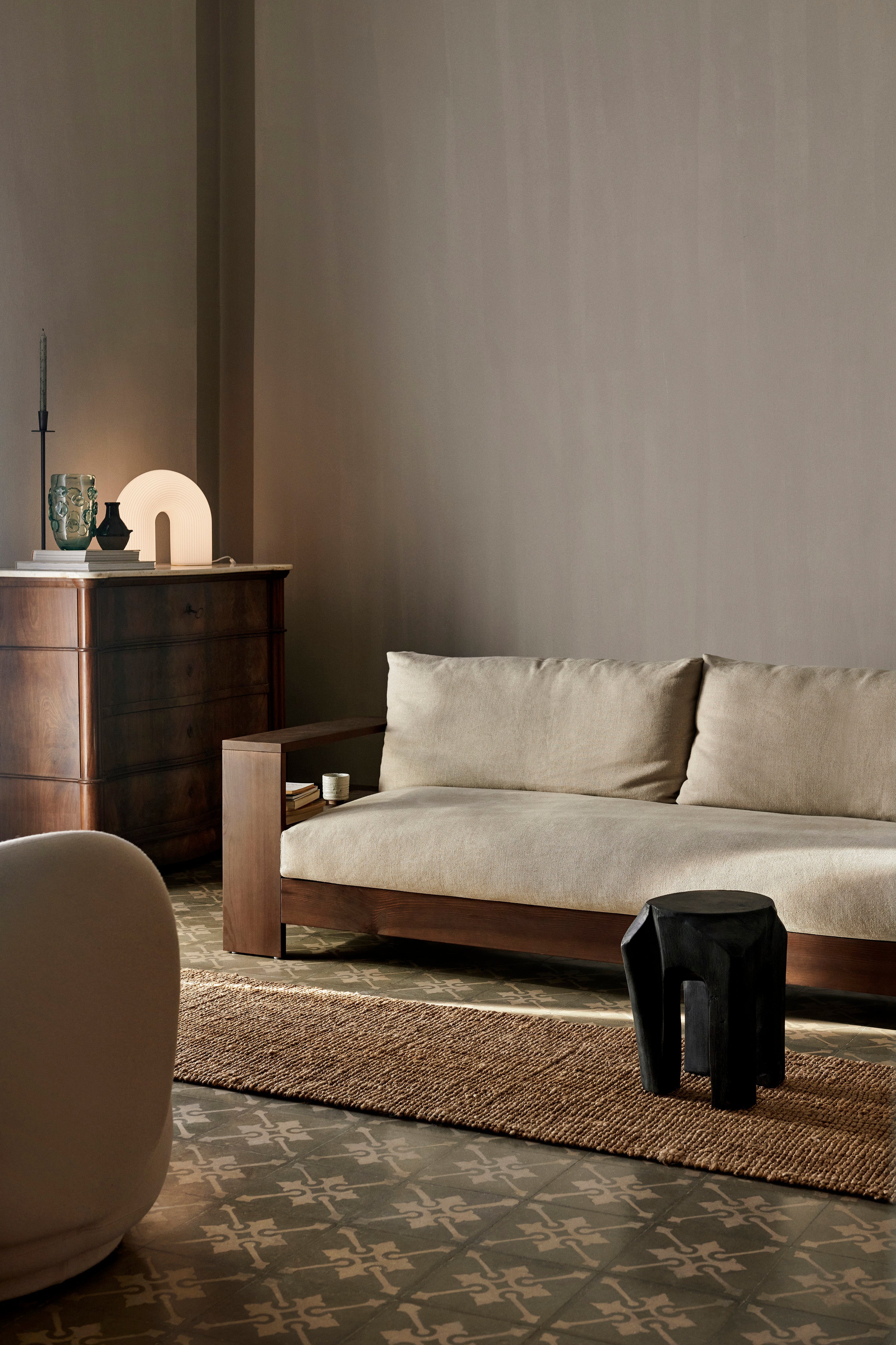 Edre beige sofa with a dark brown wooden base