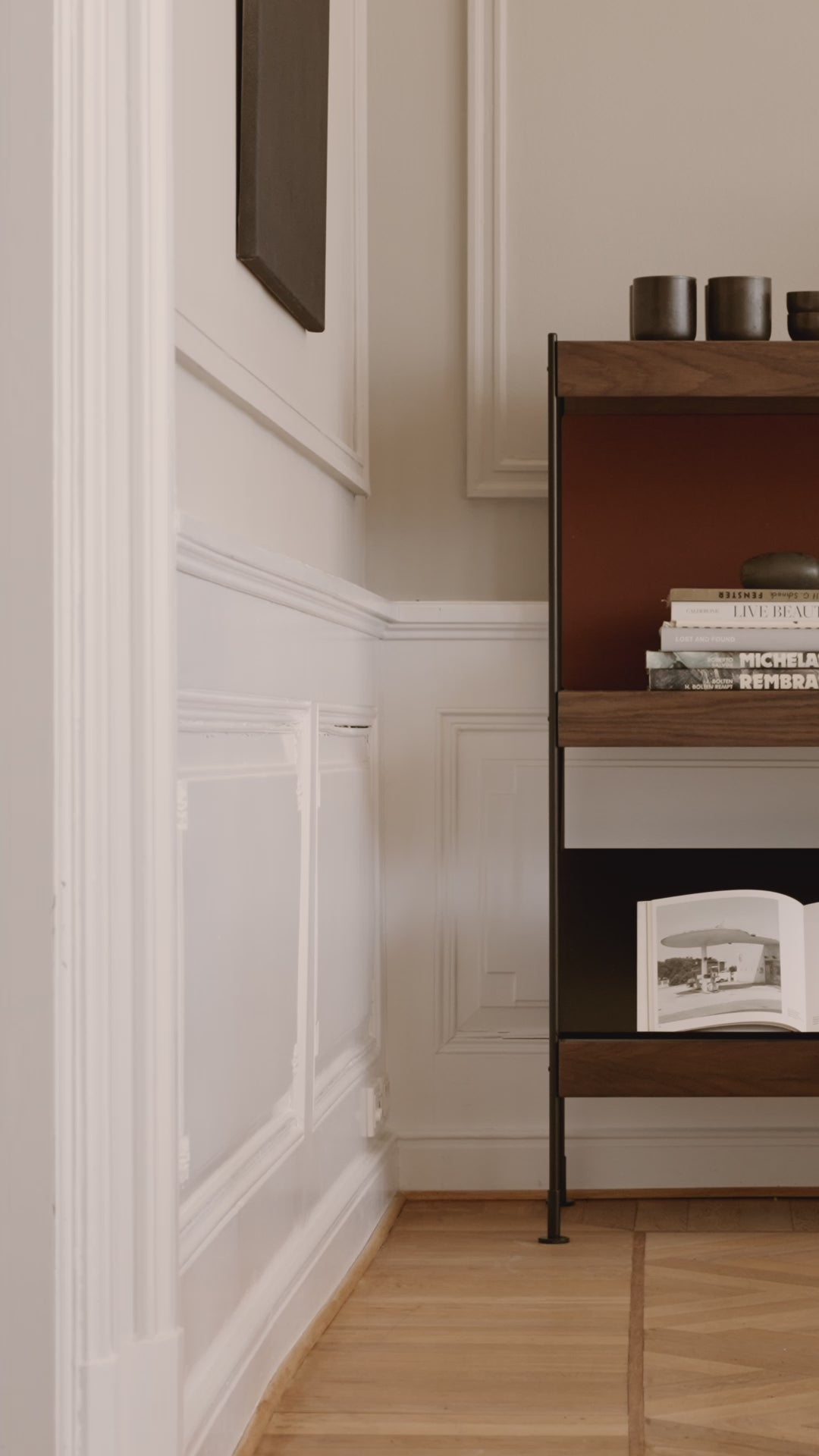 ZET shelf in dark oak wood with a black frame