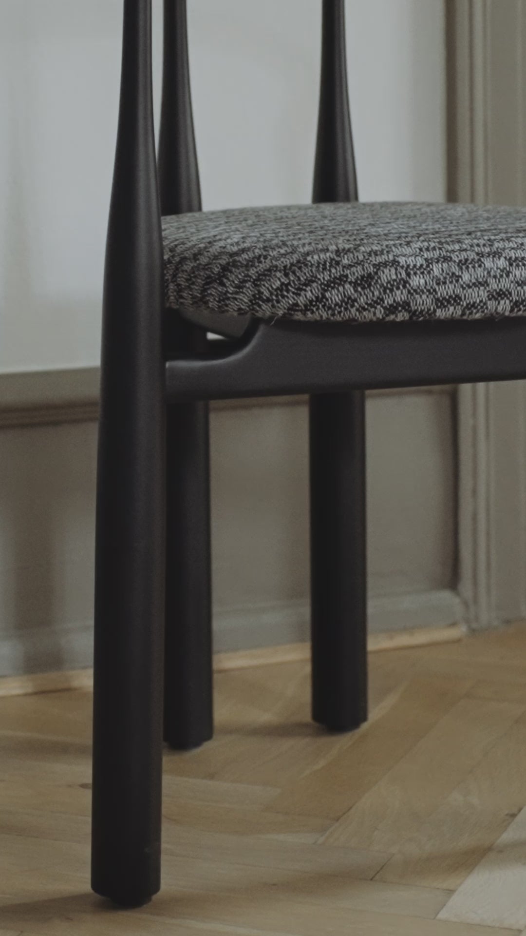 Bukowski chair upholstered with a black beech base
