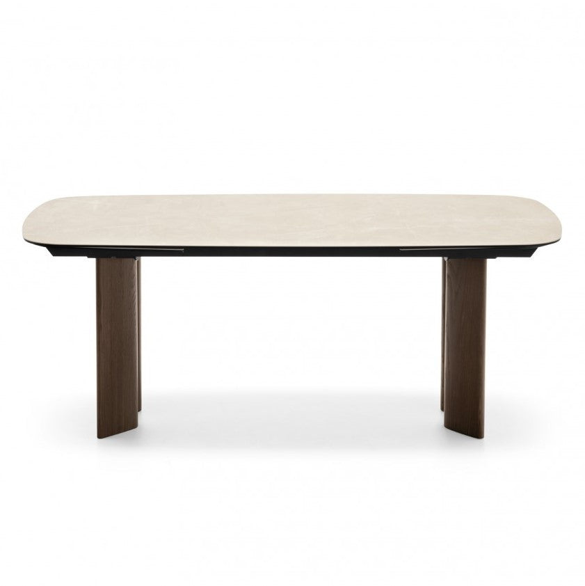 SANDY extendable table with a ceramic top resembling travertine and a walnut base