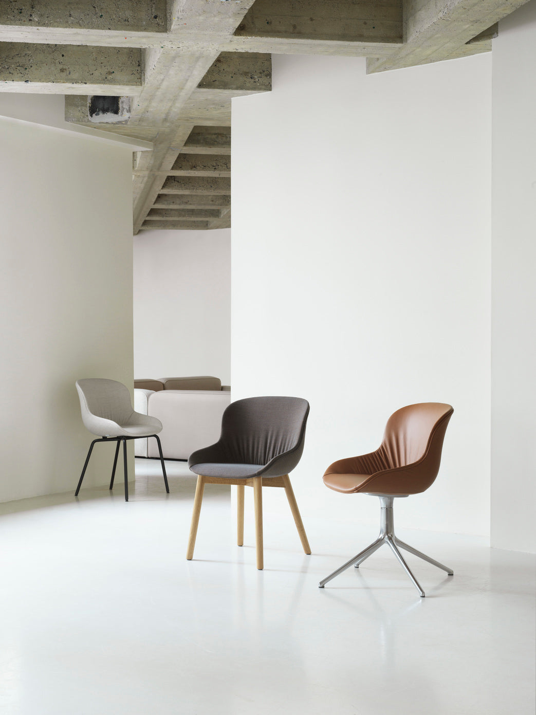 Hyg Comfort chair upholstered with a gray base