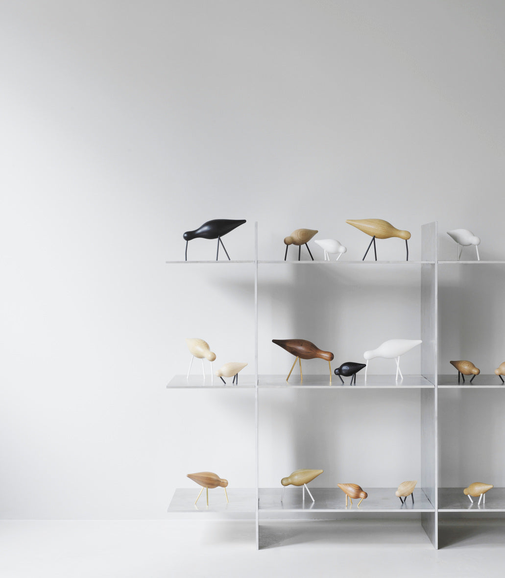 Shorebird -Figur hellgelb mit schwarzen Beinen