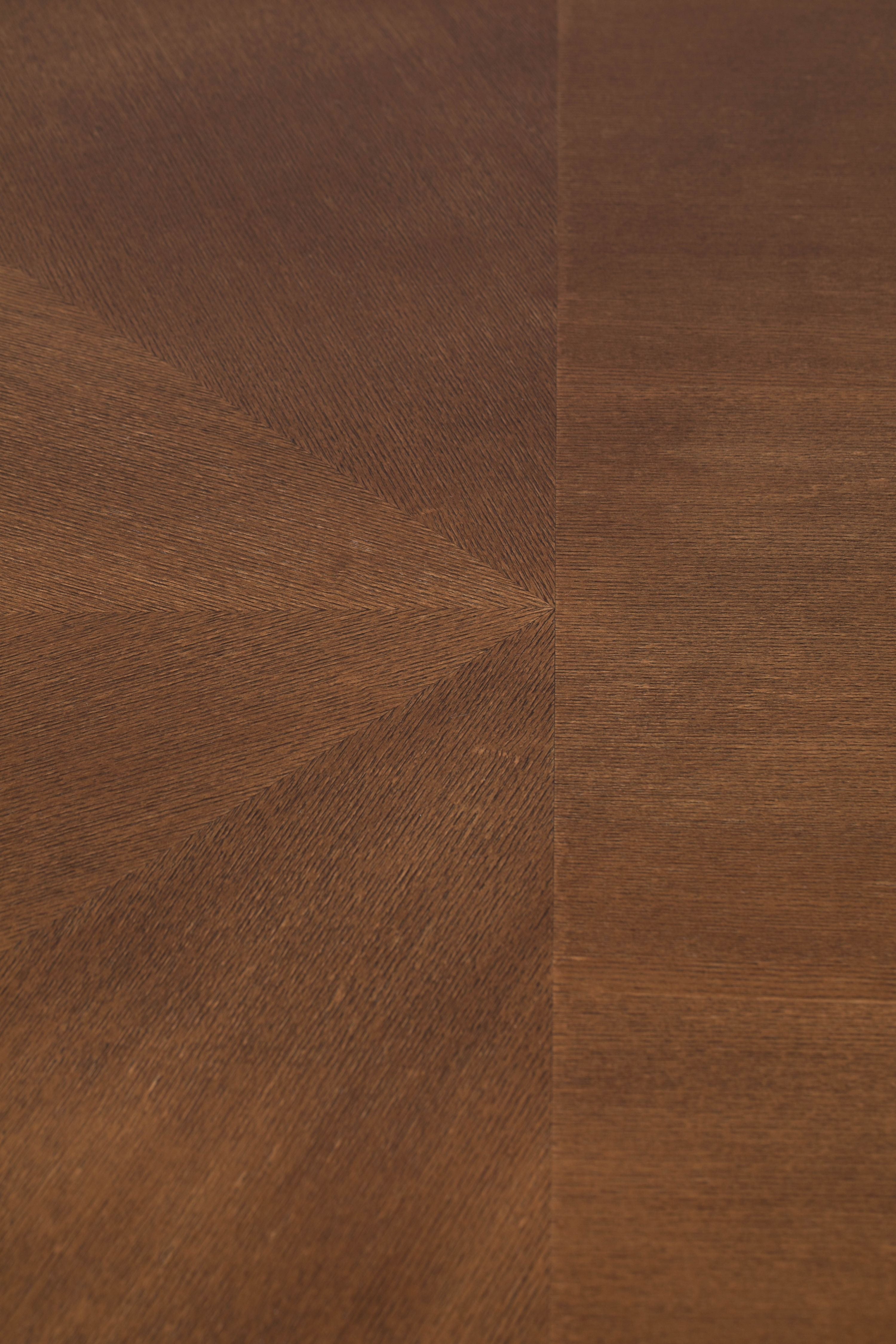 Oval table Denise veneer ash with a black base