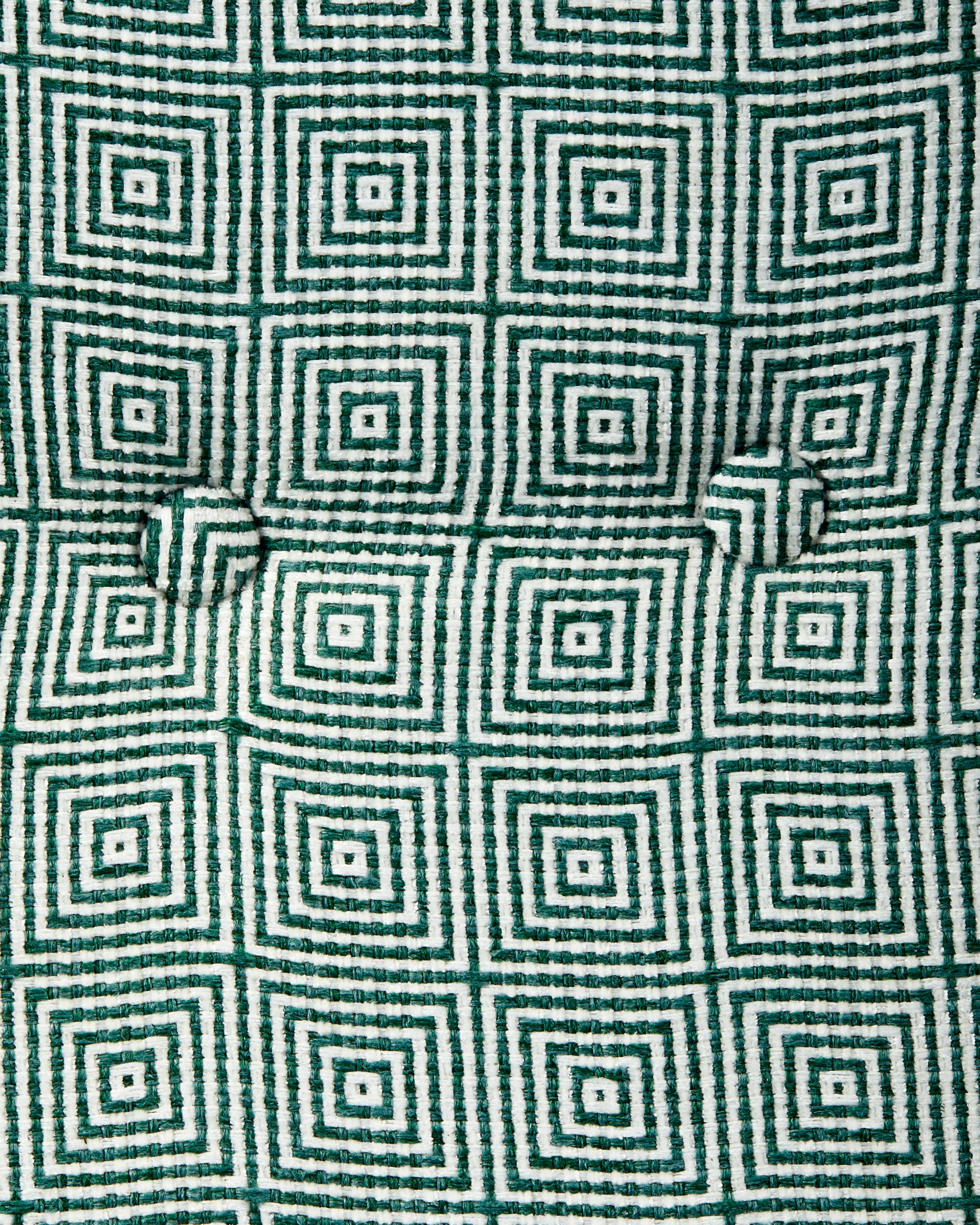 PEGGY armchair in green with geometric patterns and a wooden base