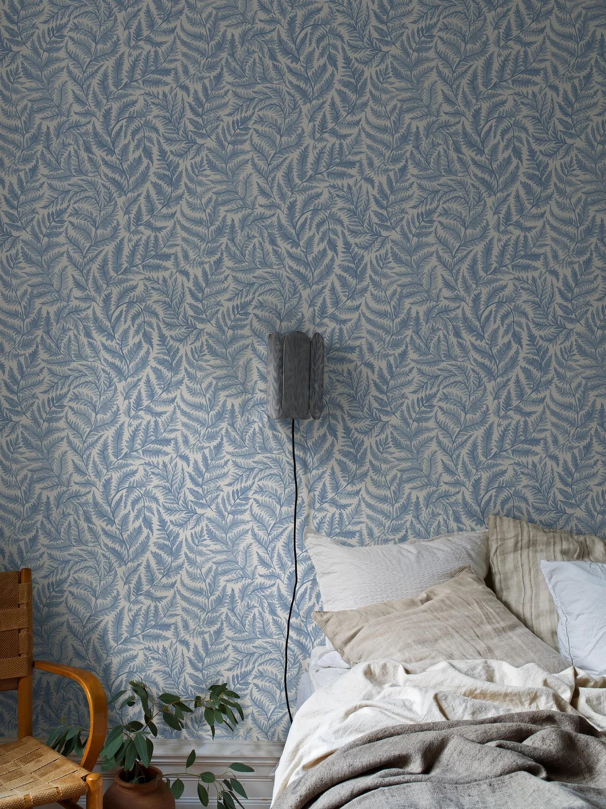 Non-woven paper wallpaper with a plant pattern FERNS light blue with white