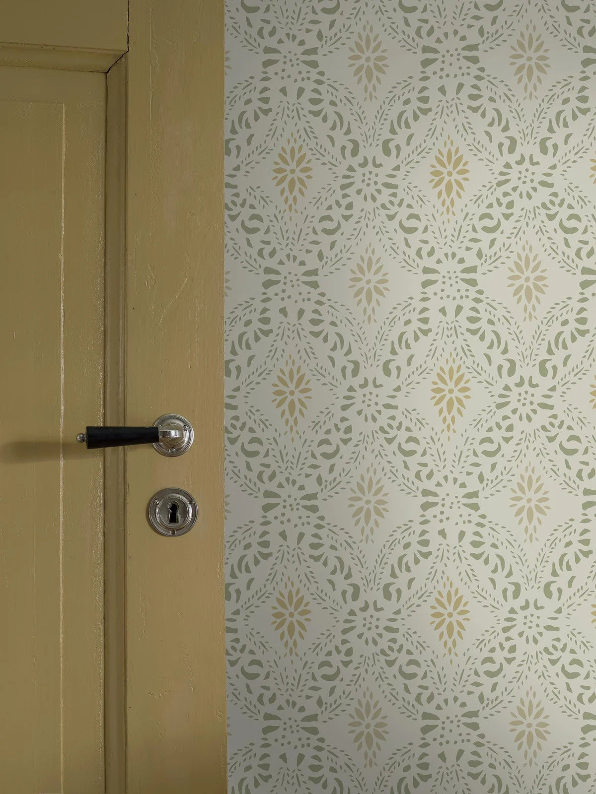 Non-woven paper wallpaper with geometric pattern KVARNHOLMEN white with green