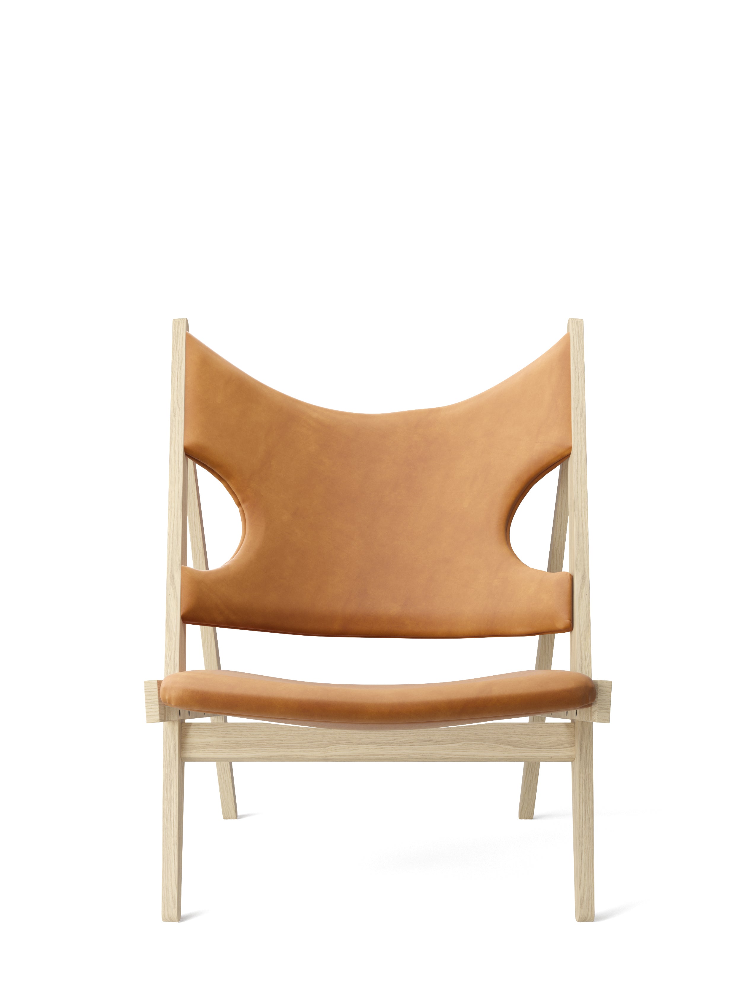 KNITTING armchair in cognac leather with oak base