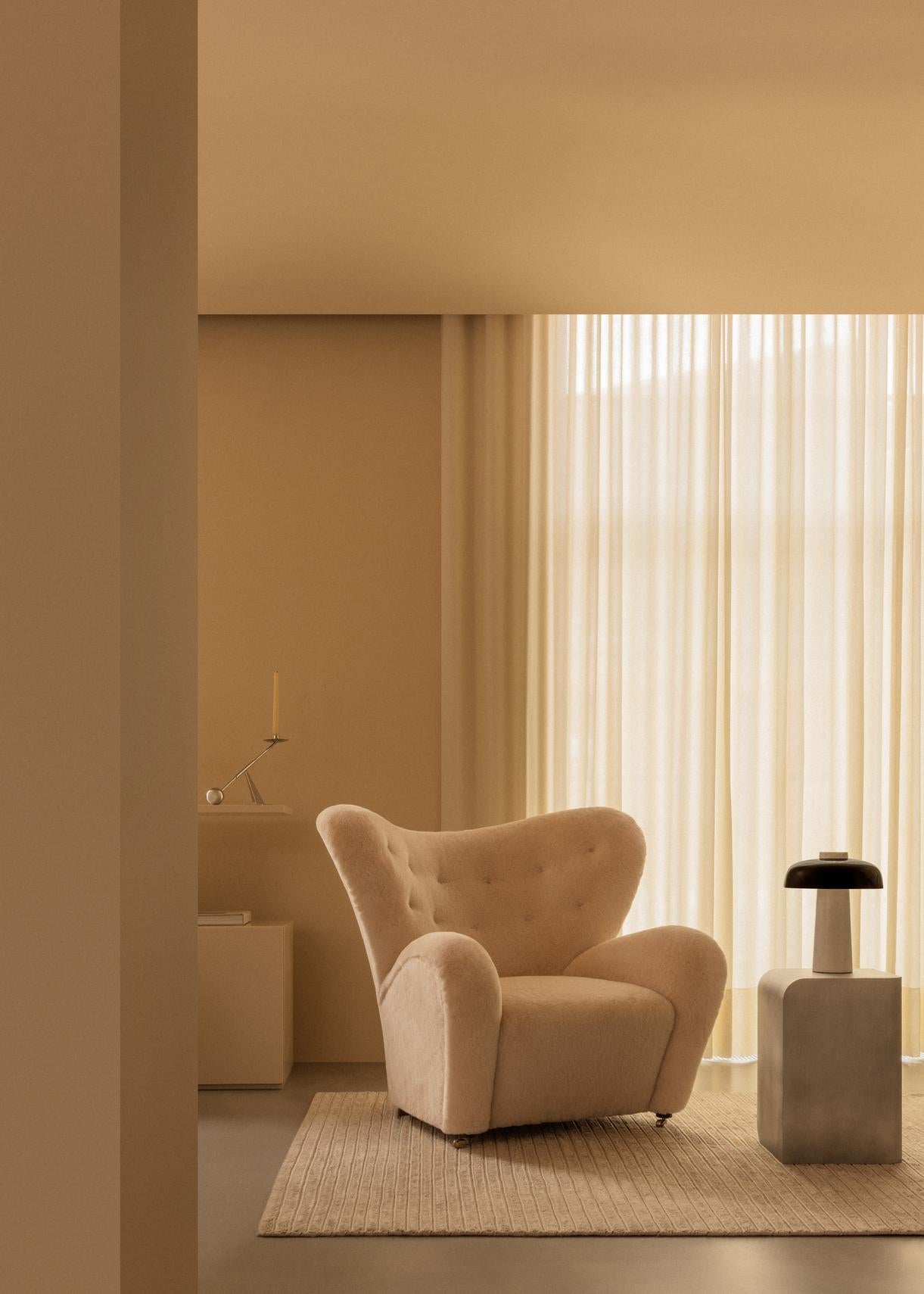 REVERSE table lamp with a brown shade and a stone base
