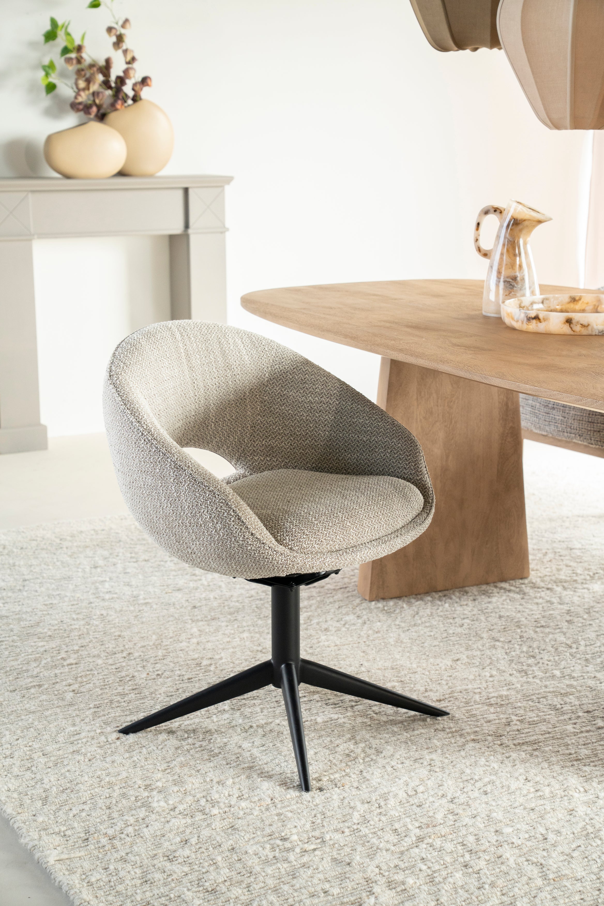 NOL taupe swivel chair with black base