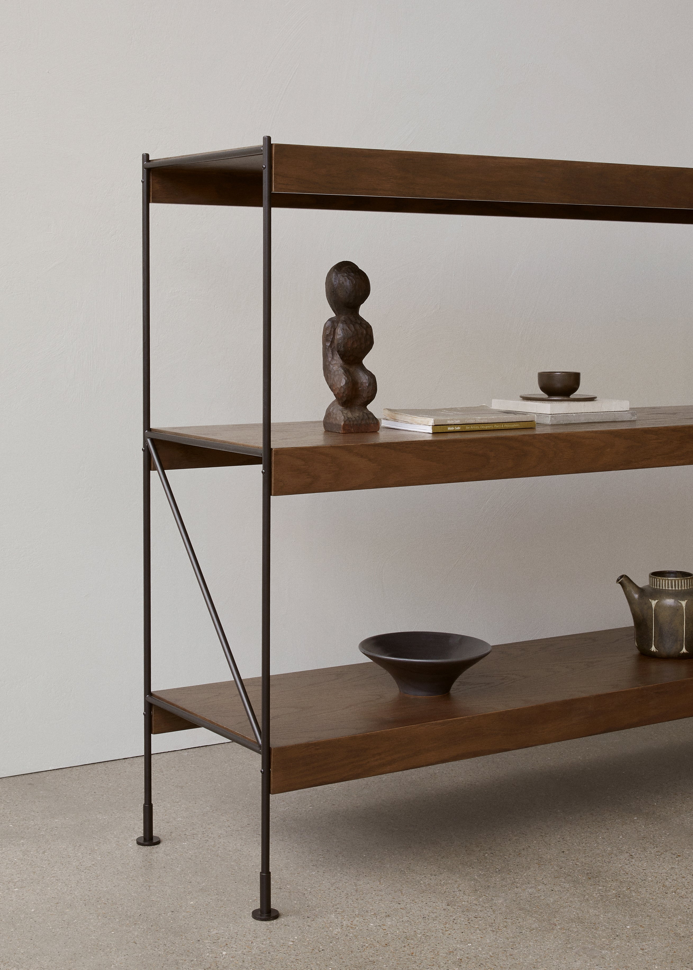 ZET shelf in dark oak wood with a black frame
