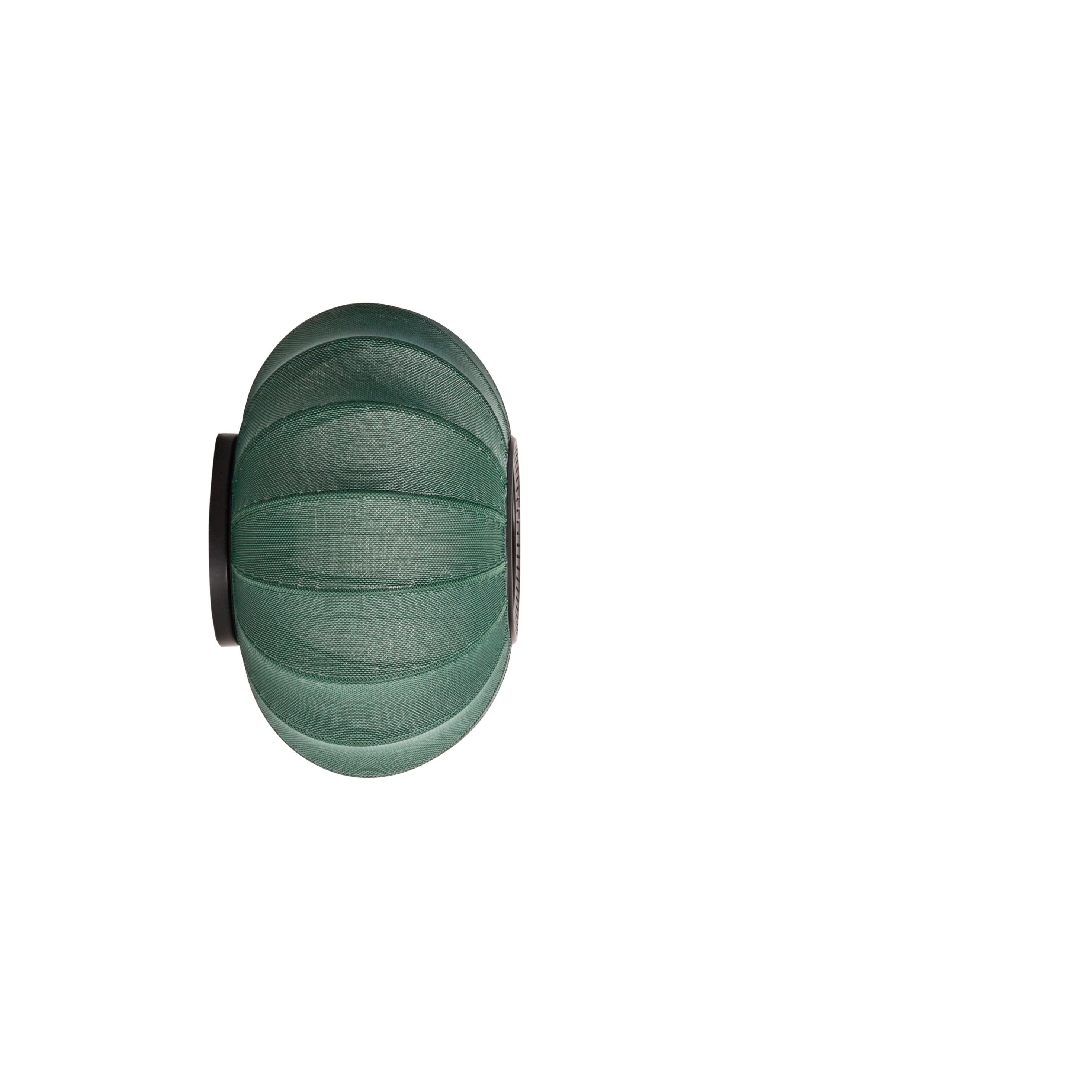 Grüne Wandlampe mit Strickweite