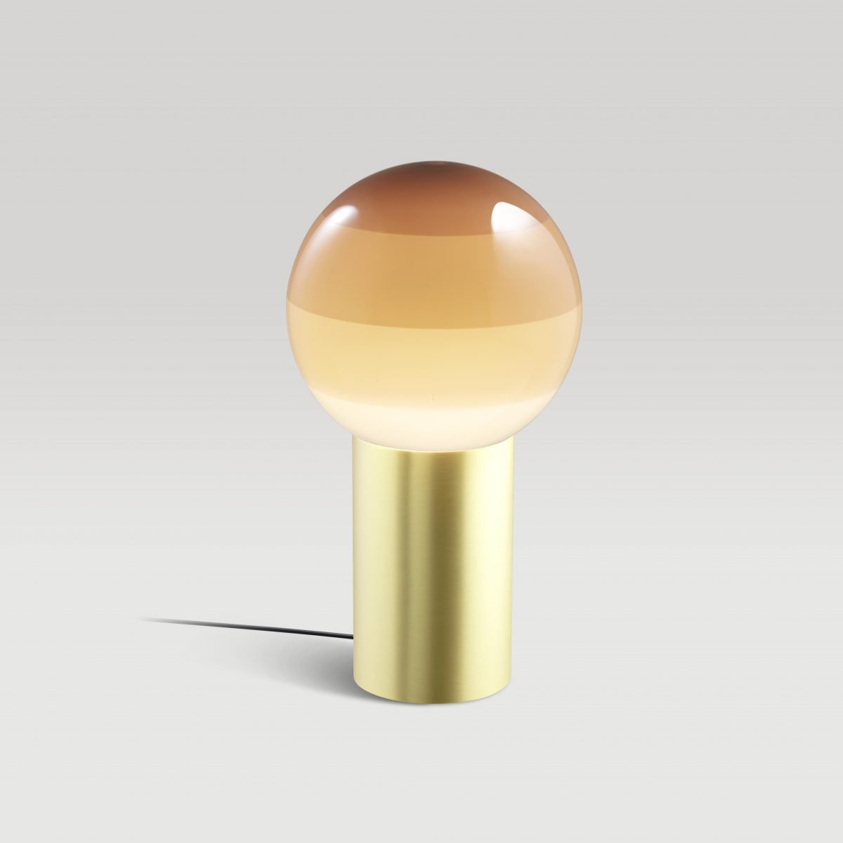 DIPPING chocolate table lamp with a gold base