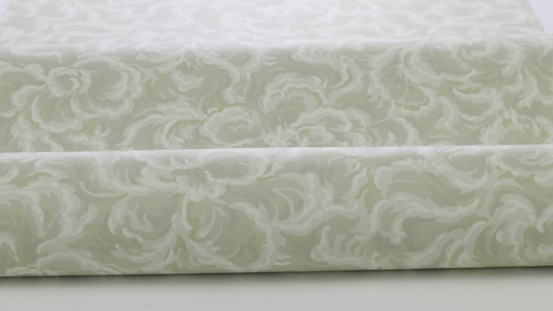 Non-woven paper wallpaper with a botanical pattern ÄNGGÅRDEN green with white