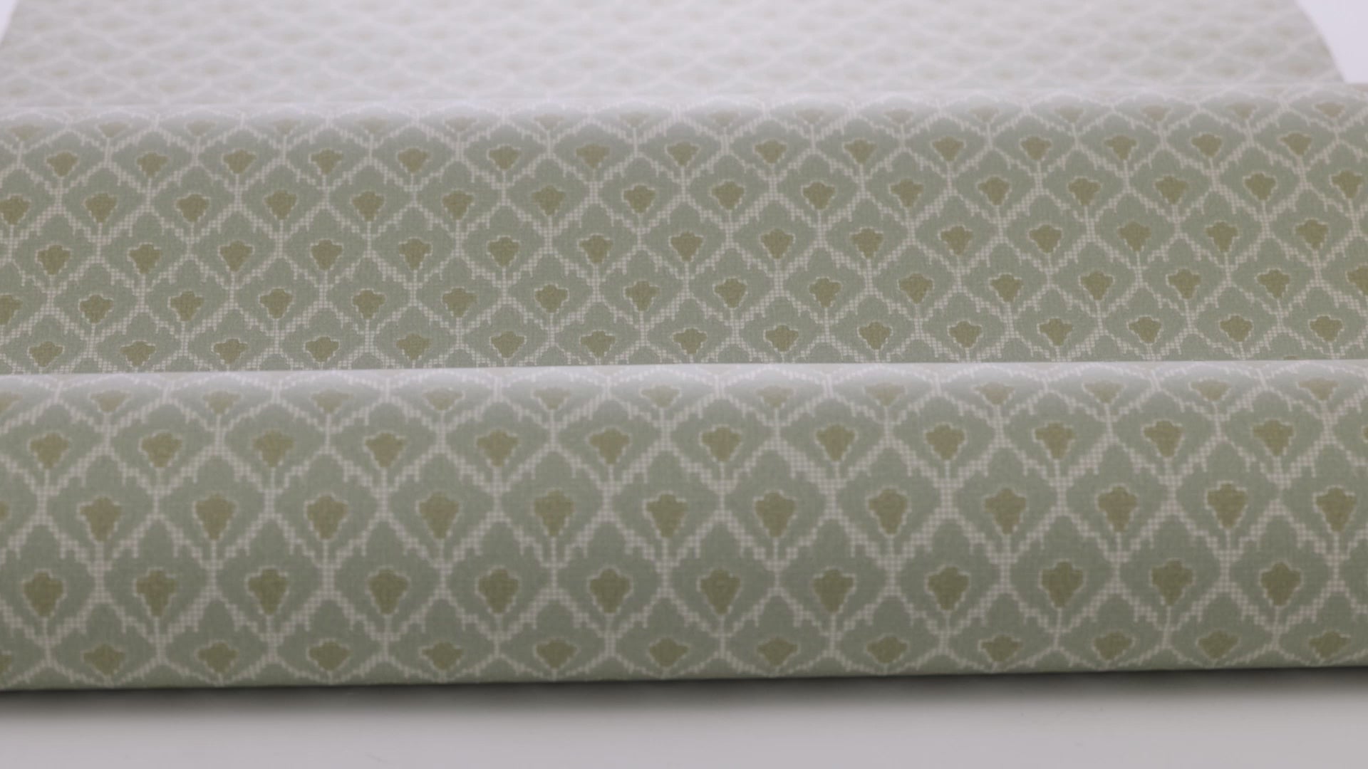 Non-woven paper wallpaper with geometric pattern SVEA green