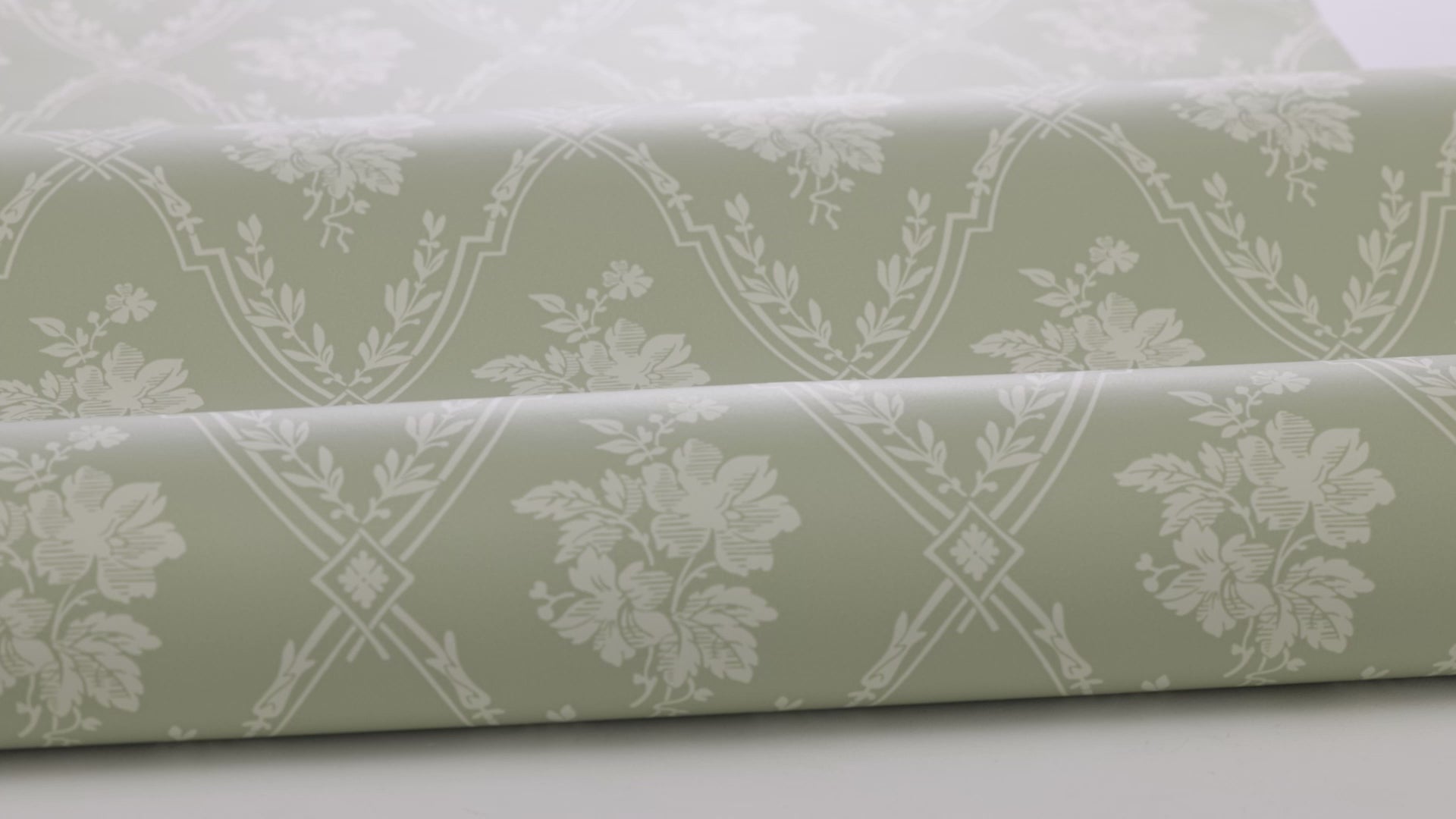Non-woven paper wallpaper with a botanical pattern VÄSTIGÅRN green