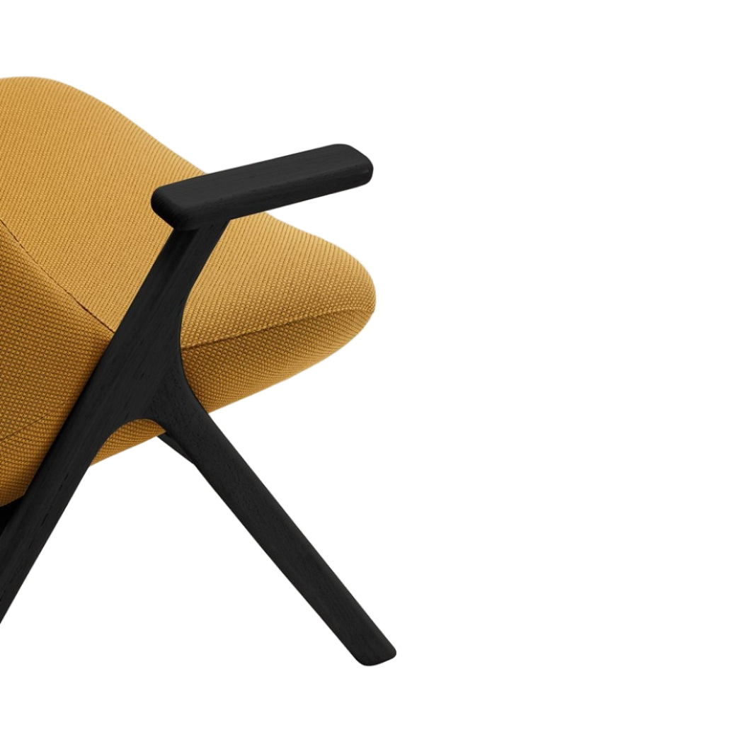 DINS mustard armchair with a black wooden base