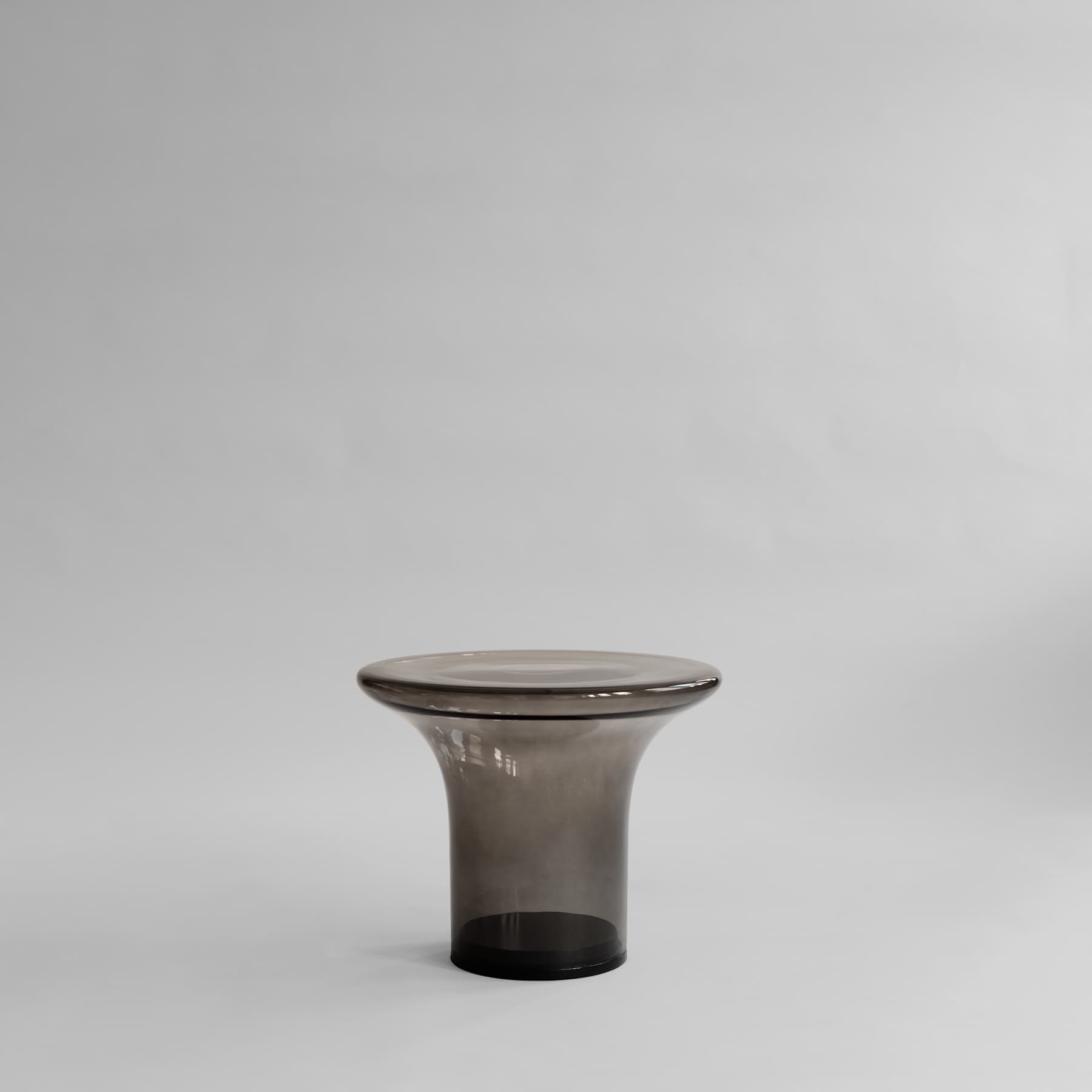 TRUMPET Couchtisch Rauchglas