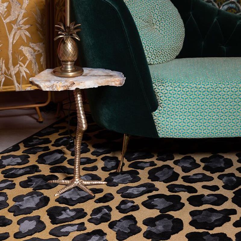 The bold monkey it's a wild world rug Mama Panther is a simple way to change the character of the room. It is a vocal point for minimalist interiors or a fun sparring partner for each room that is not afraid of a collision of prints.